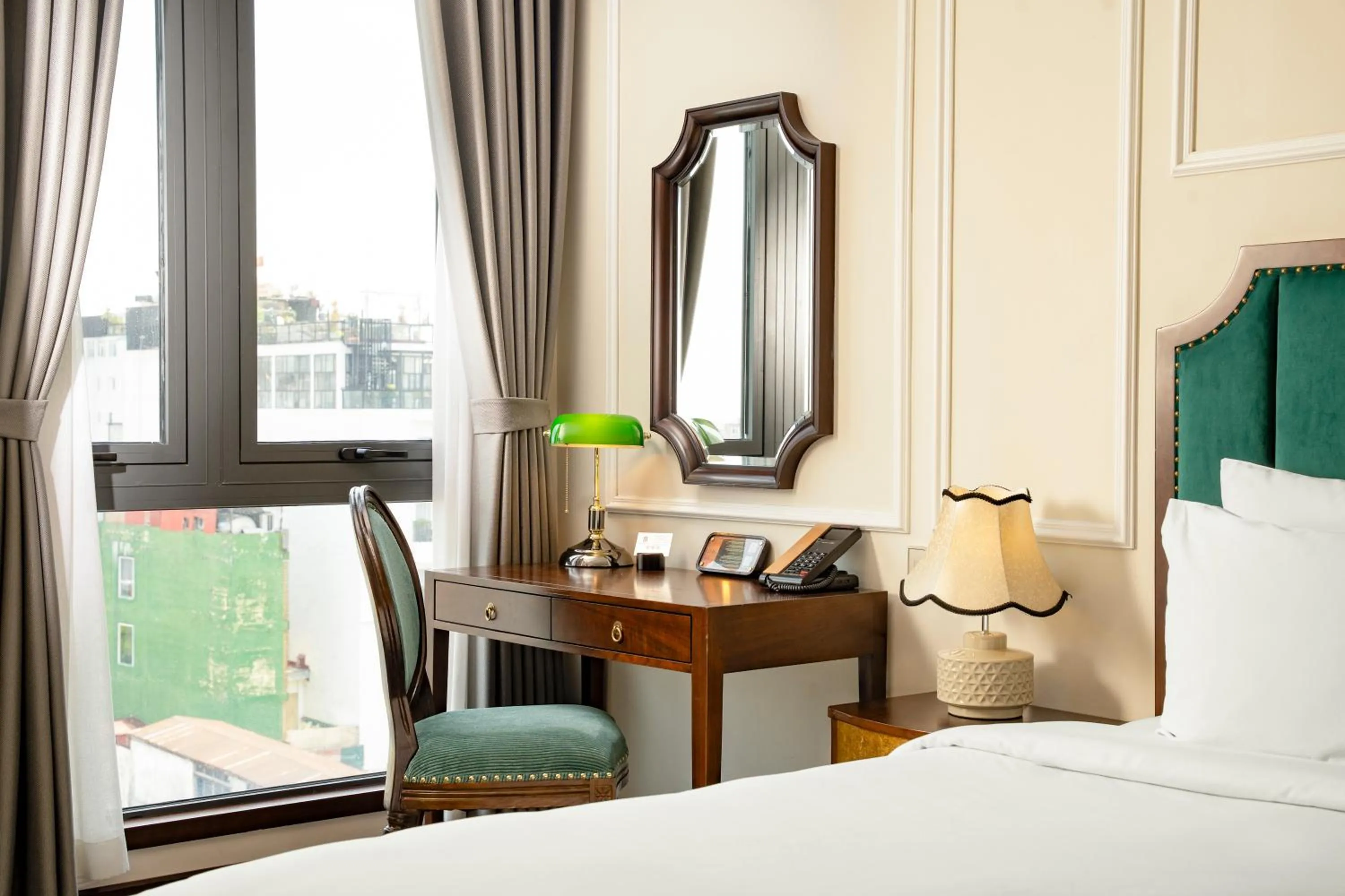 Bed in GM Premium Hotel