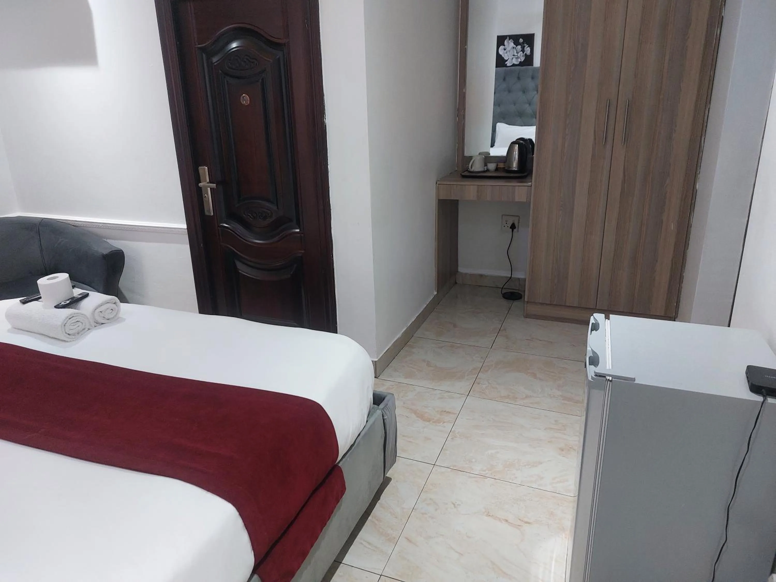 Bed in Gold Crown International Hotel Johannesburg