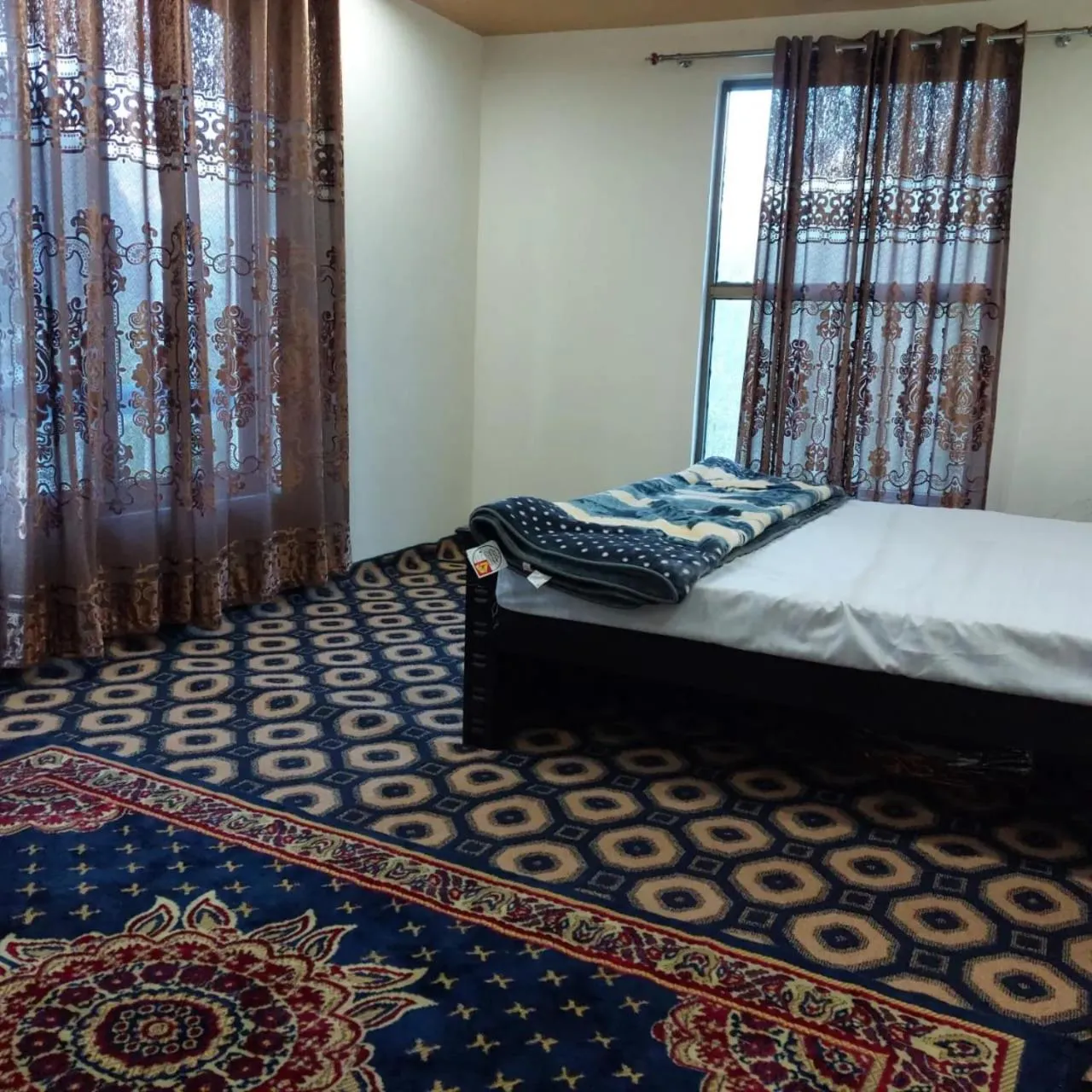 Bed in Geyari Resort Khaplu