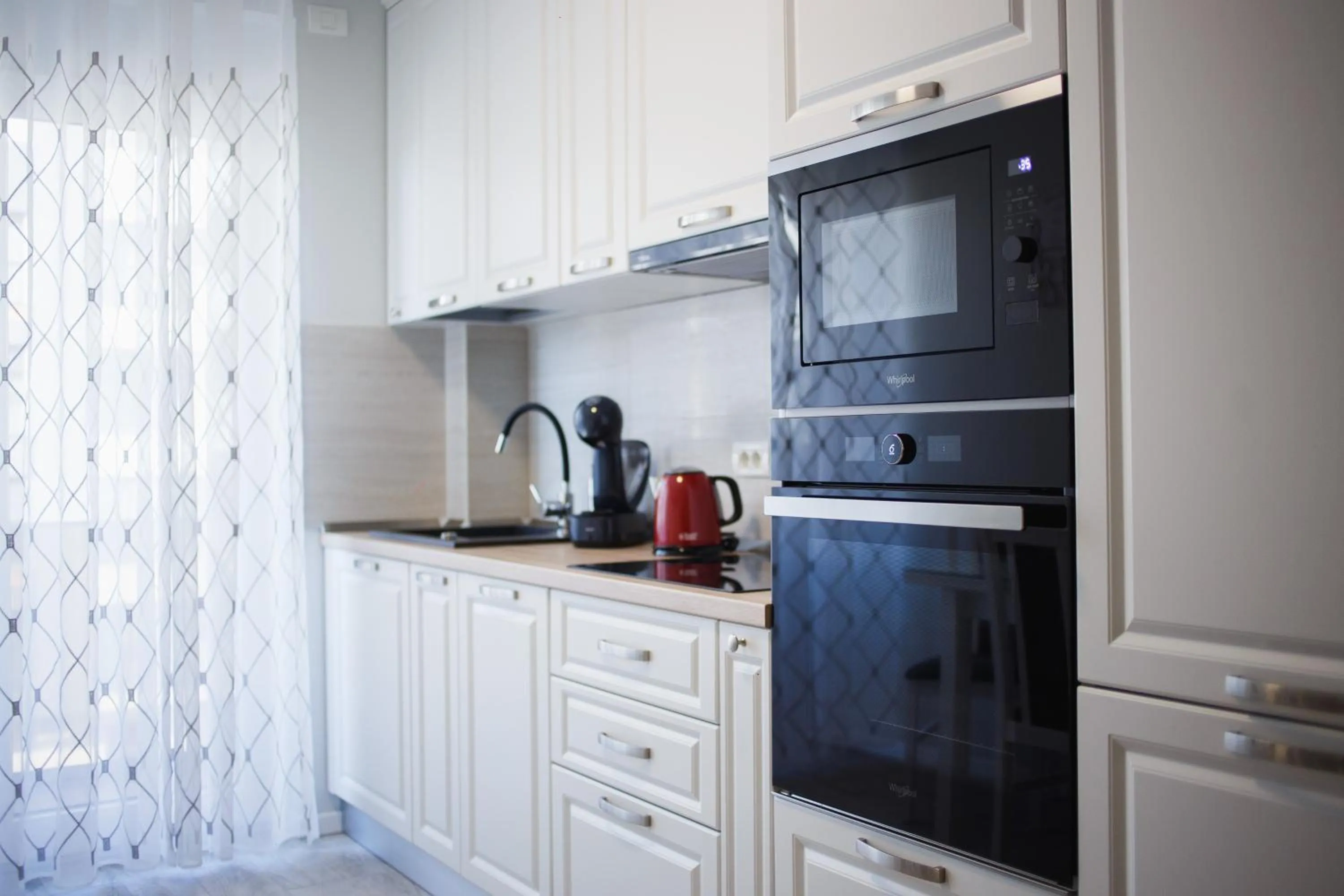 Kitchen or kitchenette in Retreat to a Stylish Home at West Residence