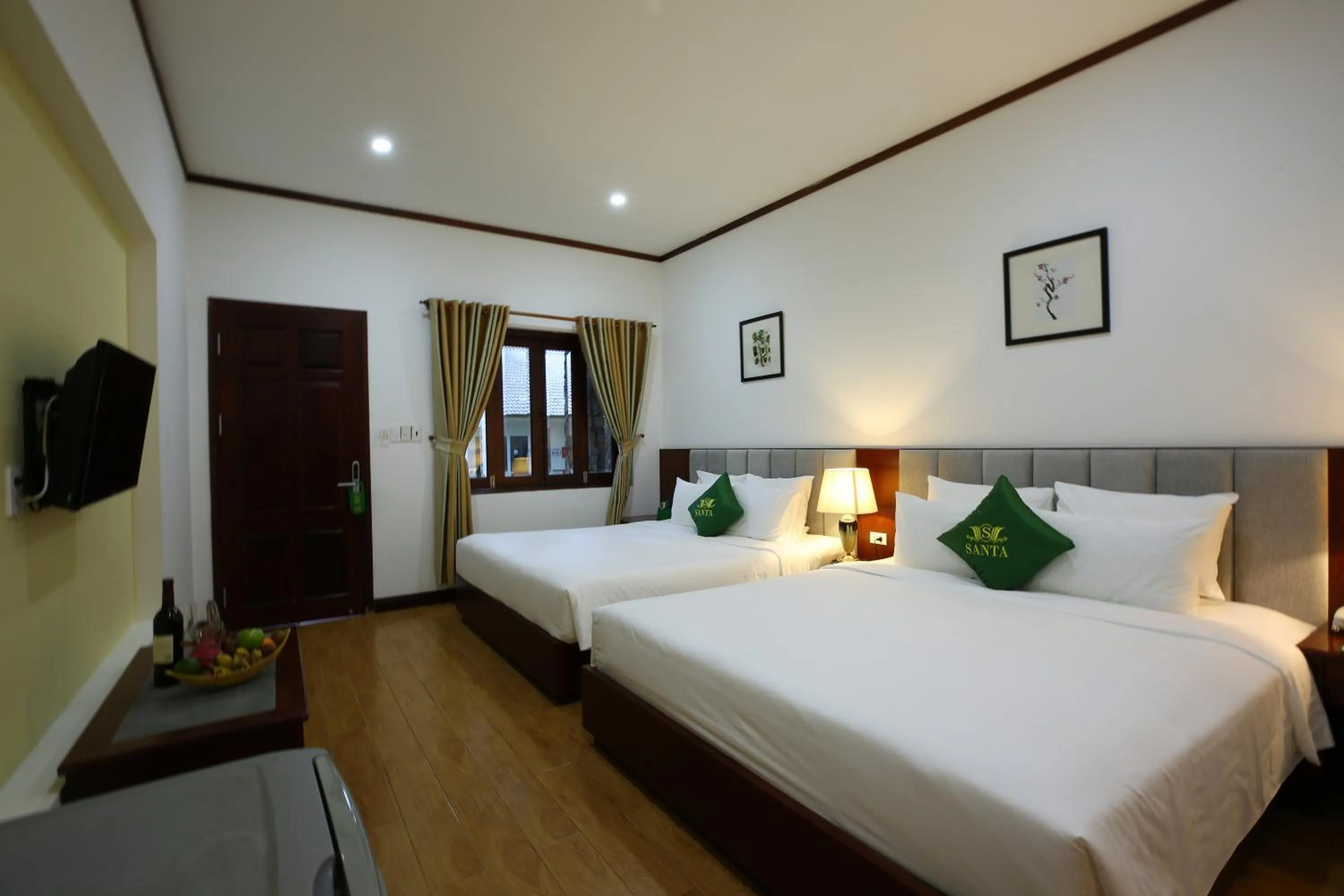 Bed in Santa Garden Resort