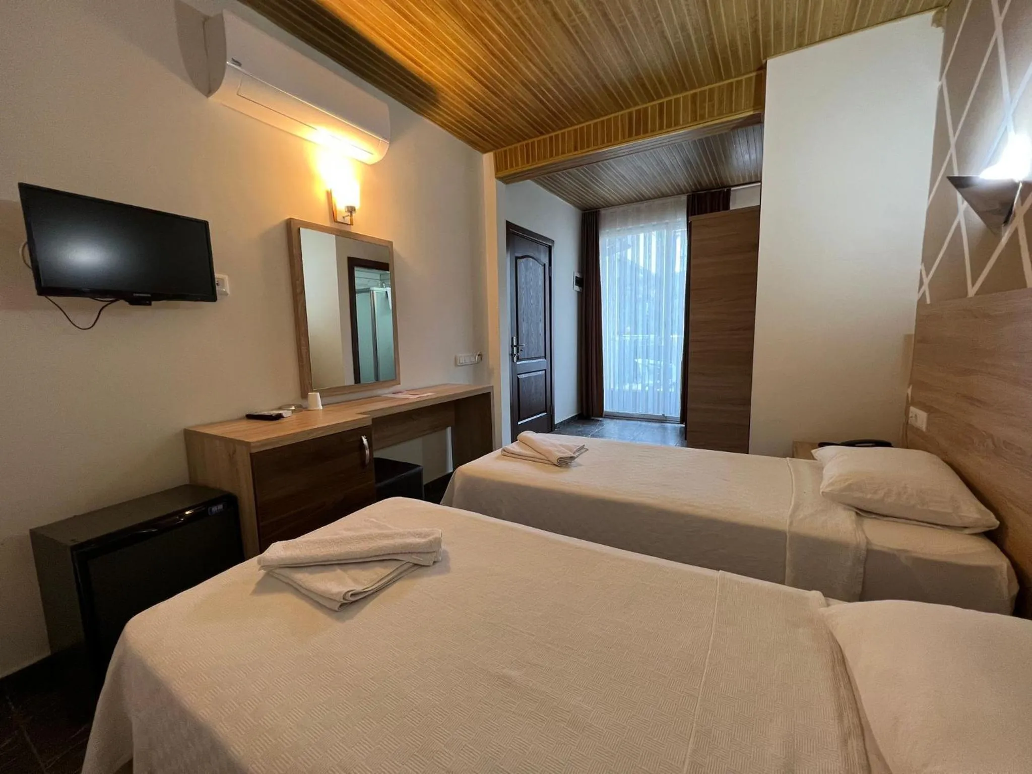 Bed in Mr Crane Hotel