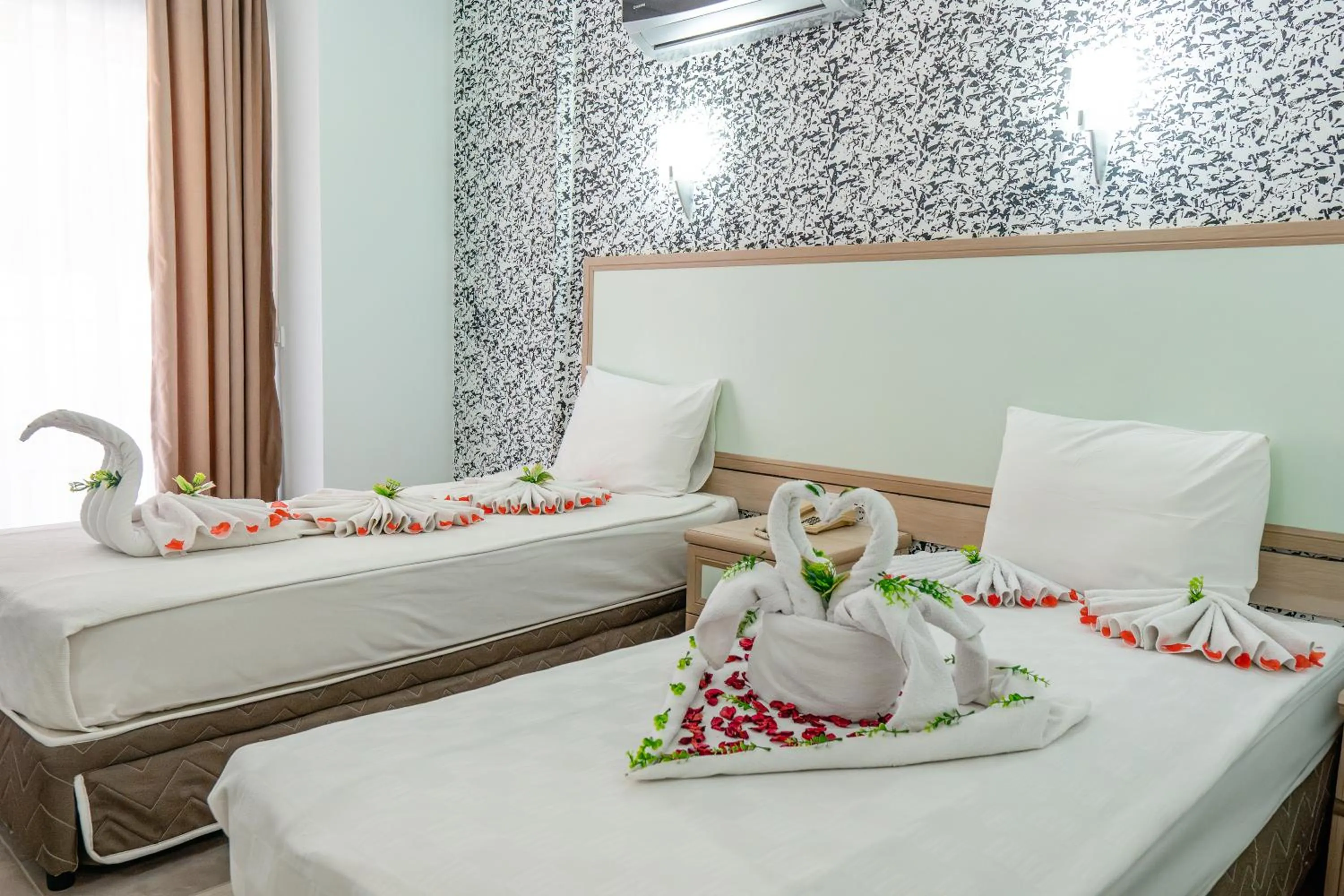 Bed in Mr Crane Hotel