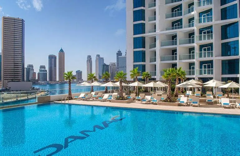 Swimming pool in Damac Maison Prive Deluxe Studio with Burj-khalifa view