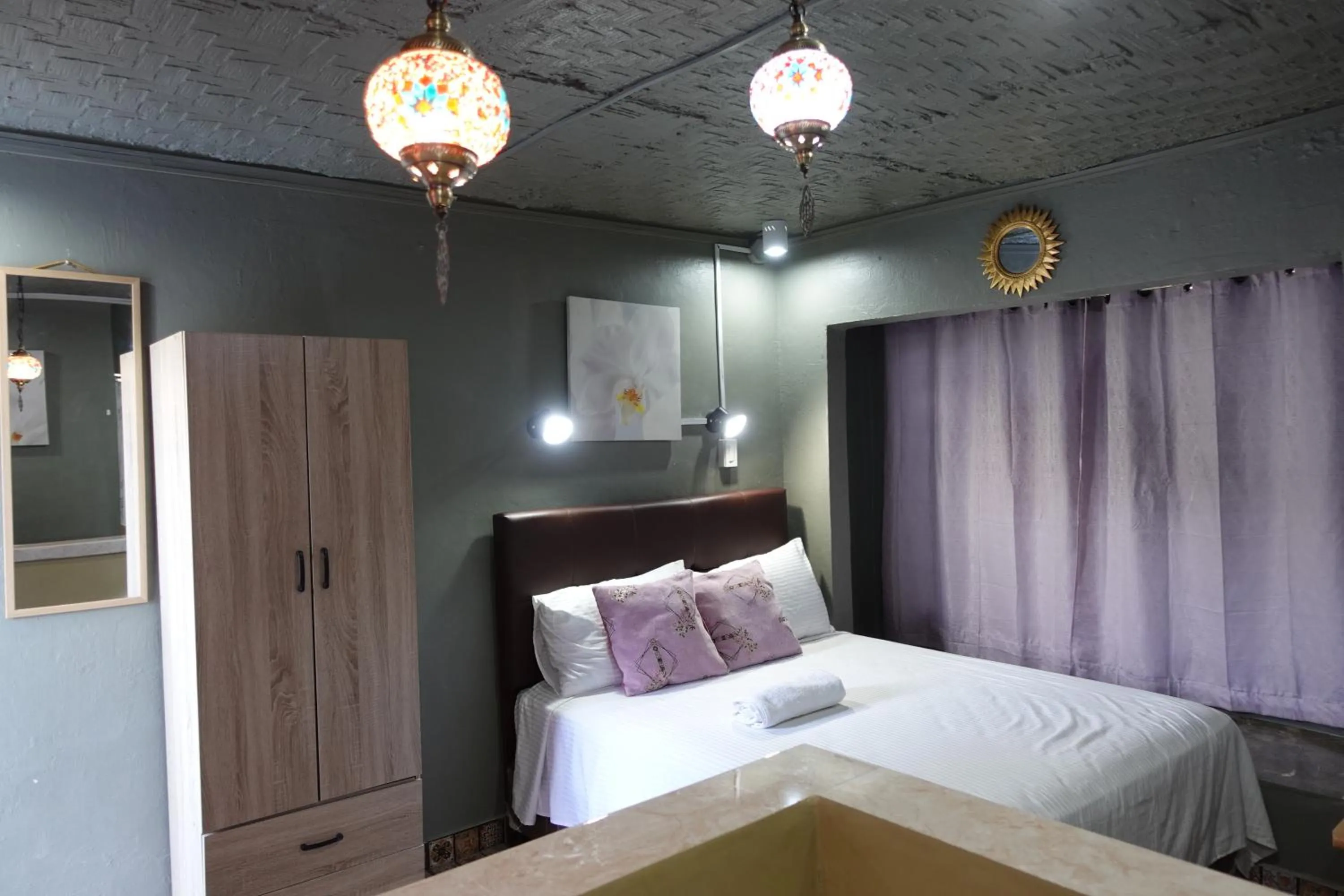 Bed in D Sanctum Resort