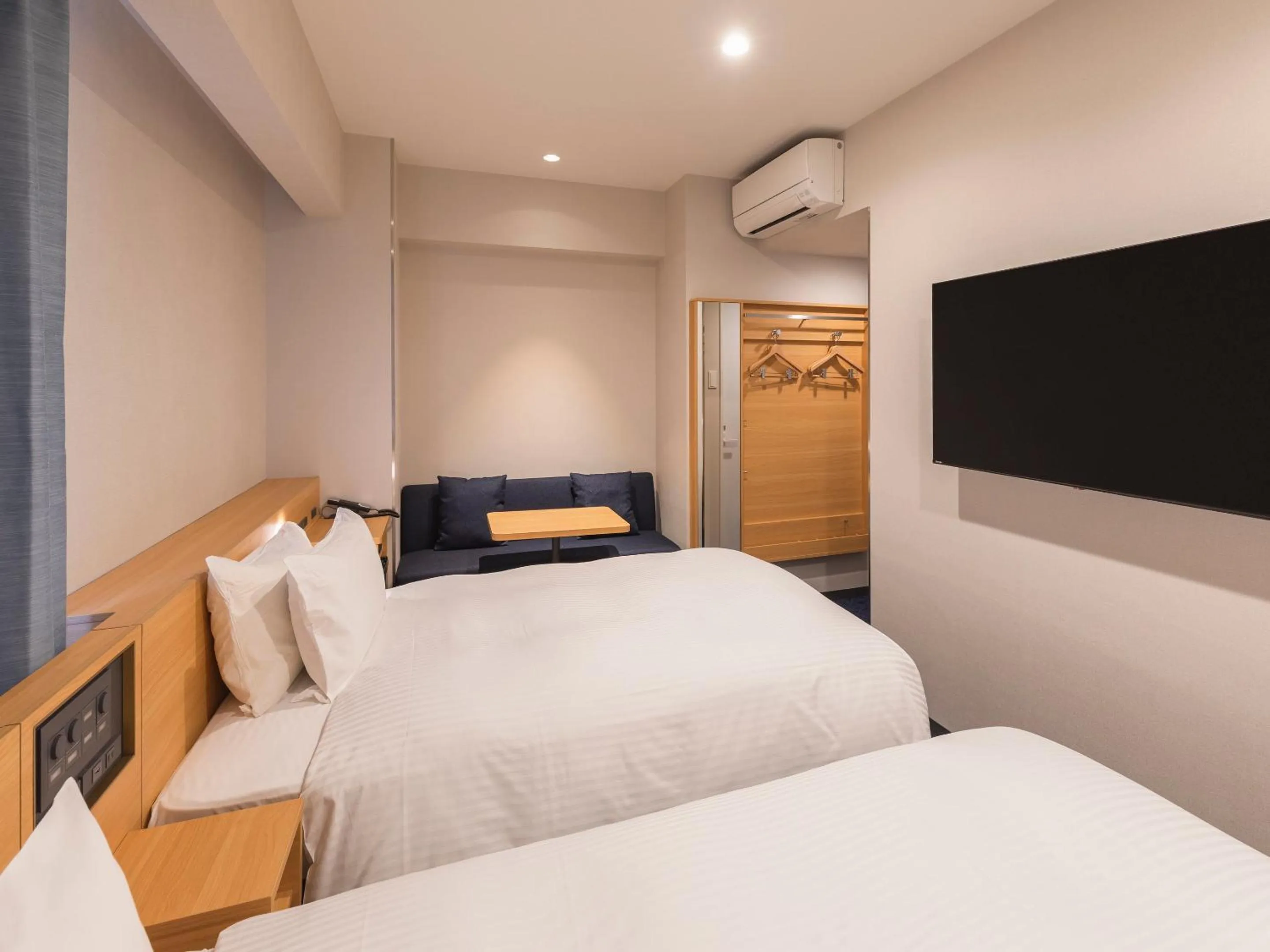 Bed in Sotetsu Fresa Inn Sendai