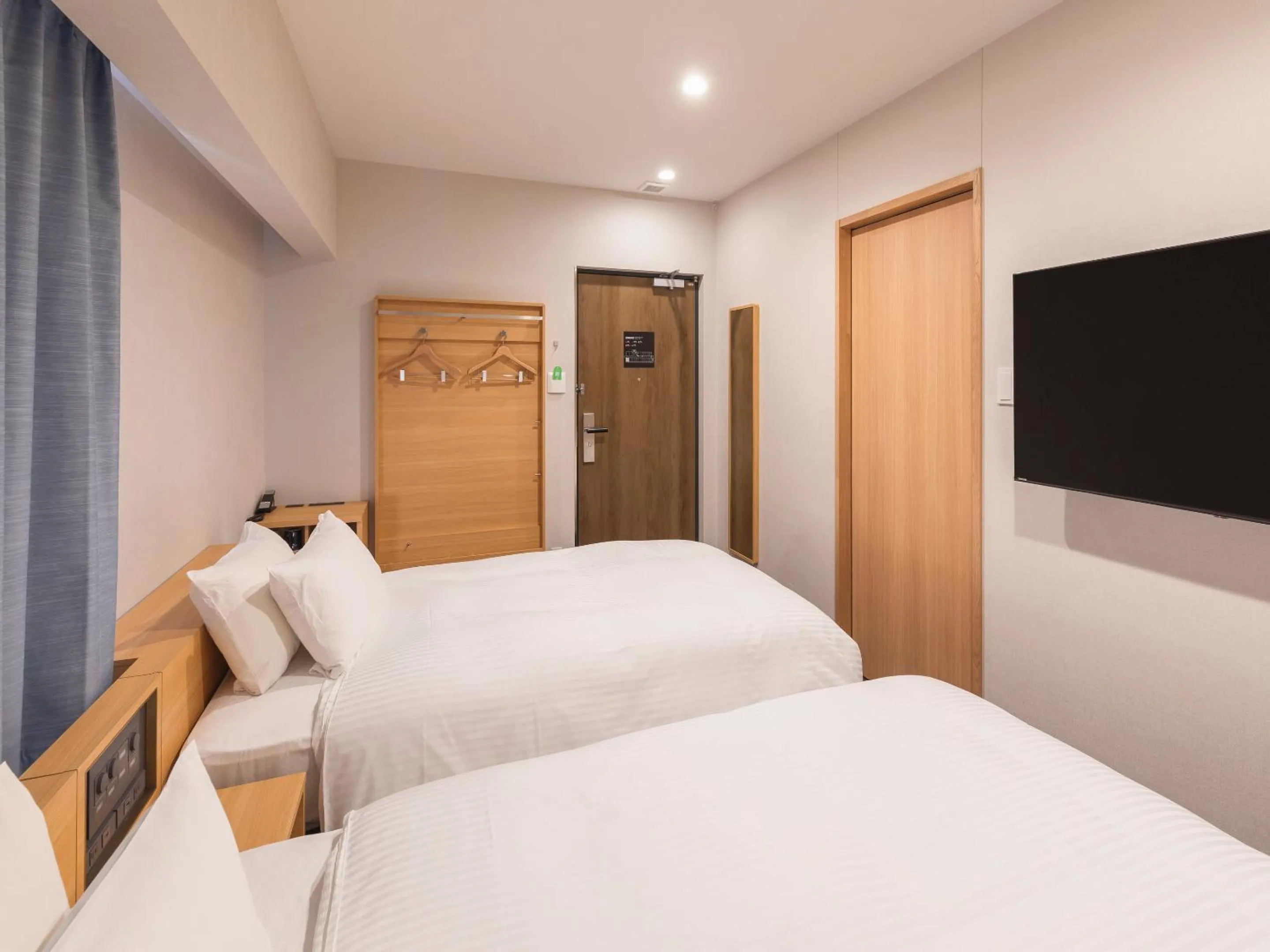 Bed in Sotetsu Fresa Inn Sendai