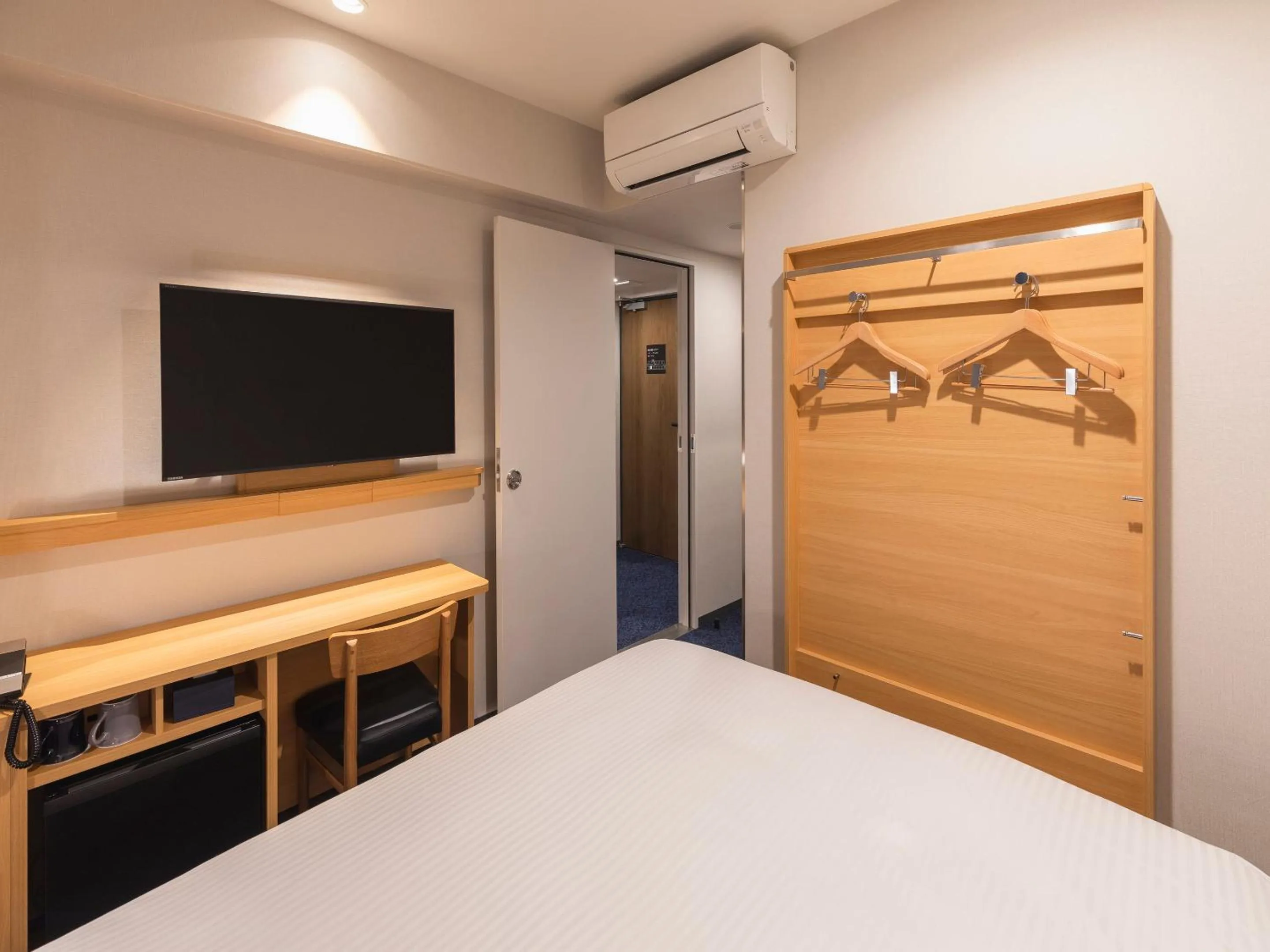 Bed in Sotetsu Fresa Inn Sendai