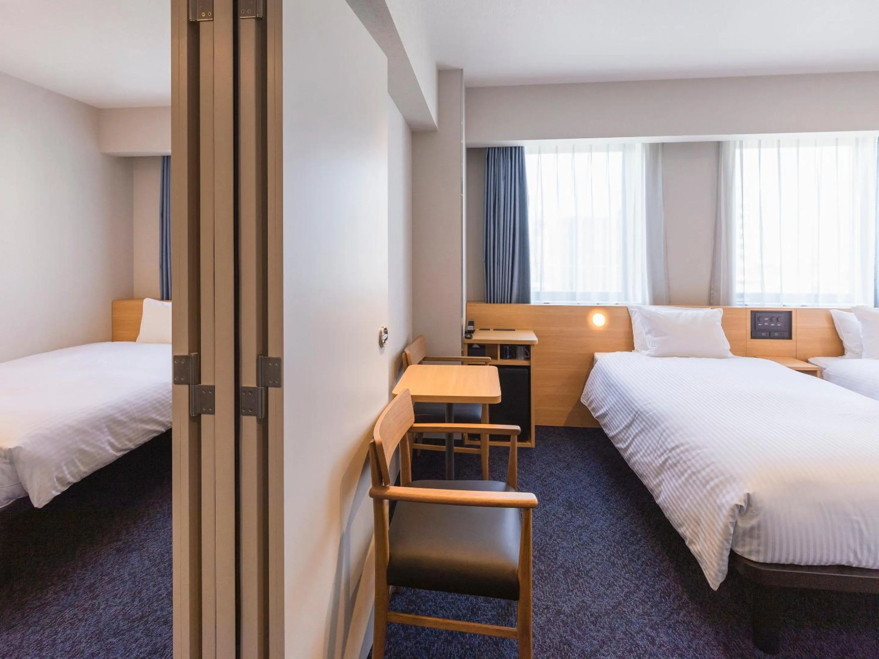 Bed in Sotetsu Fresa Inn Sendai