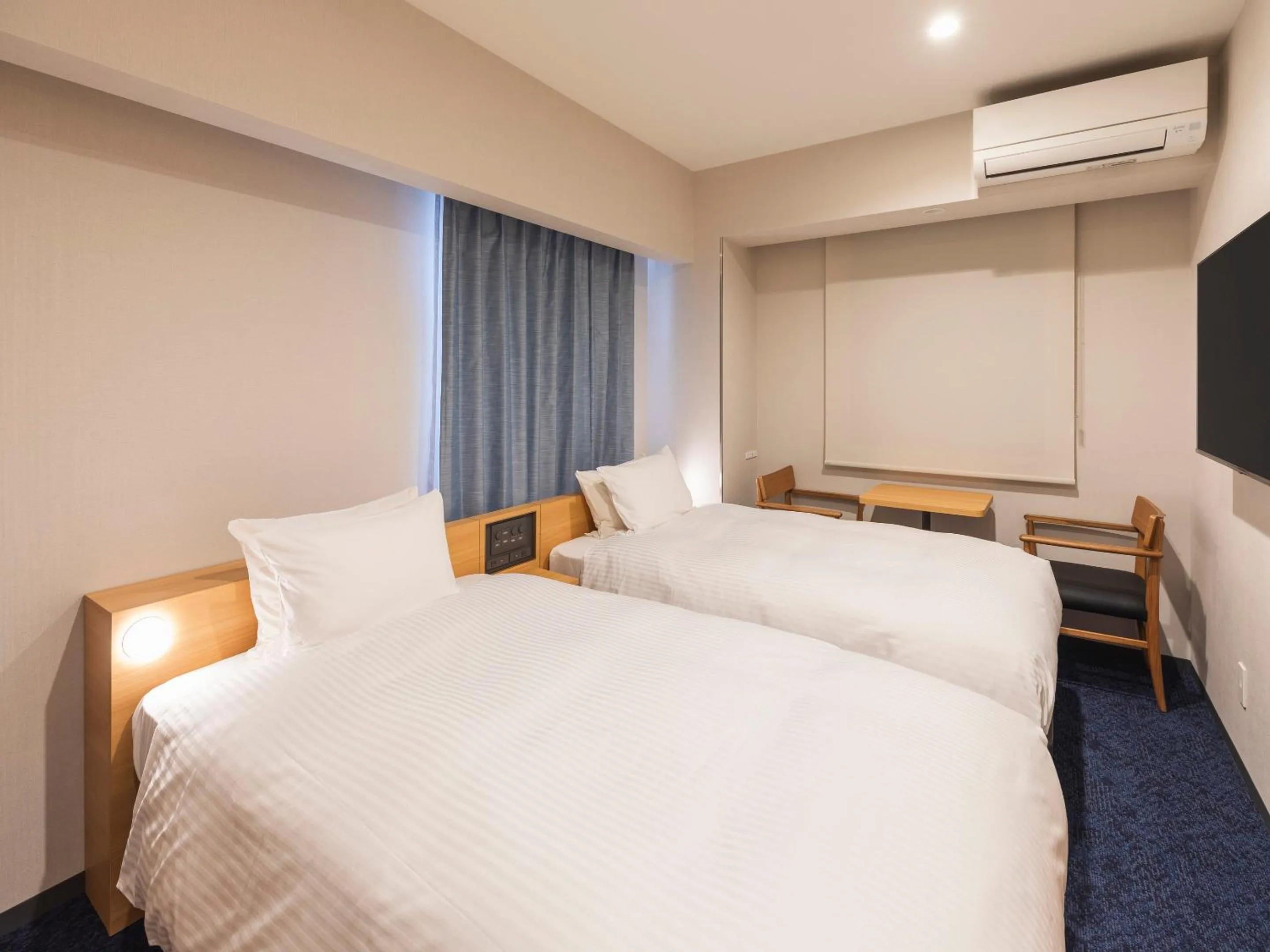 Bed in Sotetsu Fresa Inn Sendai