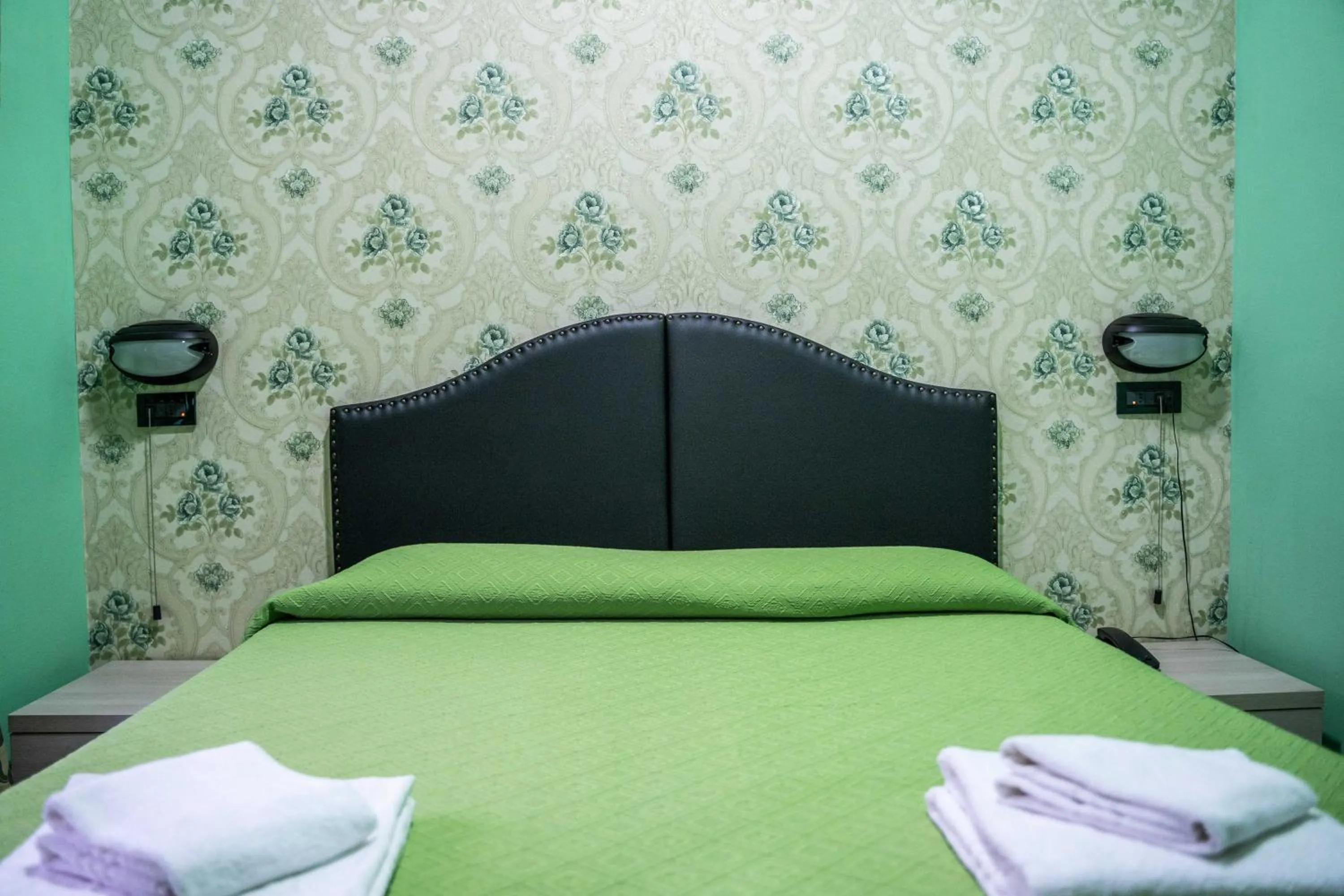 Bed in Hotel Ferrarese