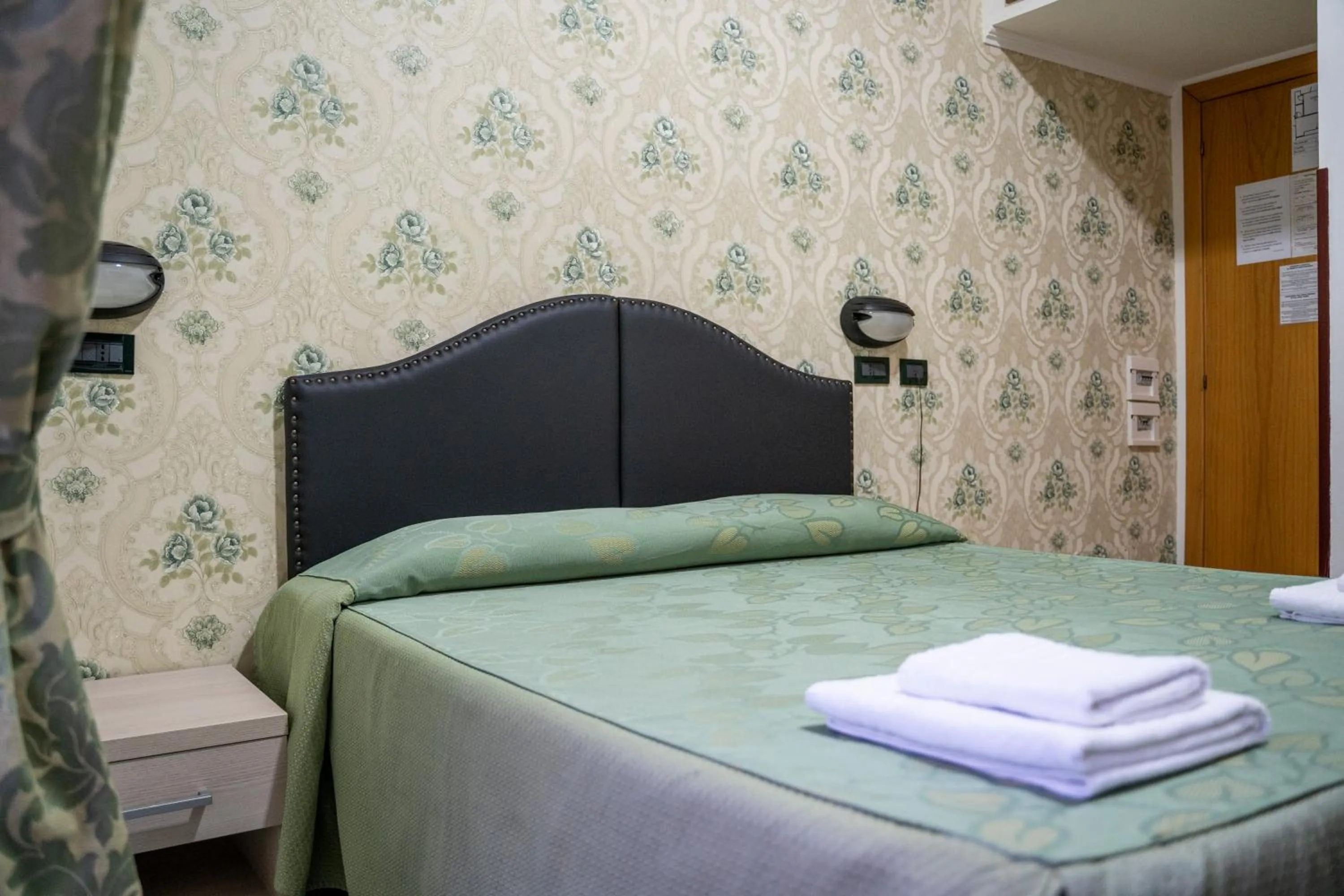 Bed in Hotel Ferrarese