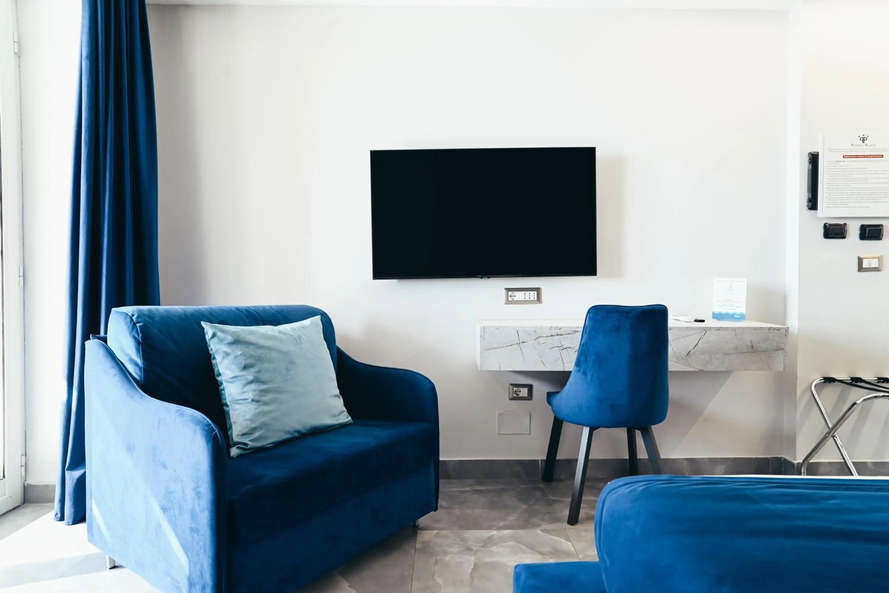 Seating area in Puteoli Palace Hotel