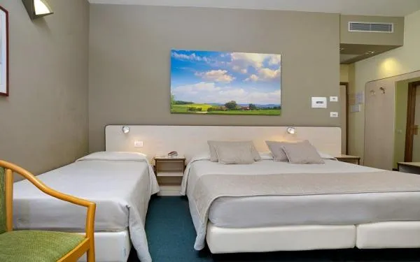 Bed in Hotel Ristorante Alcide