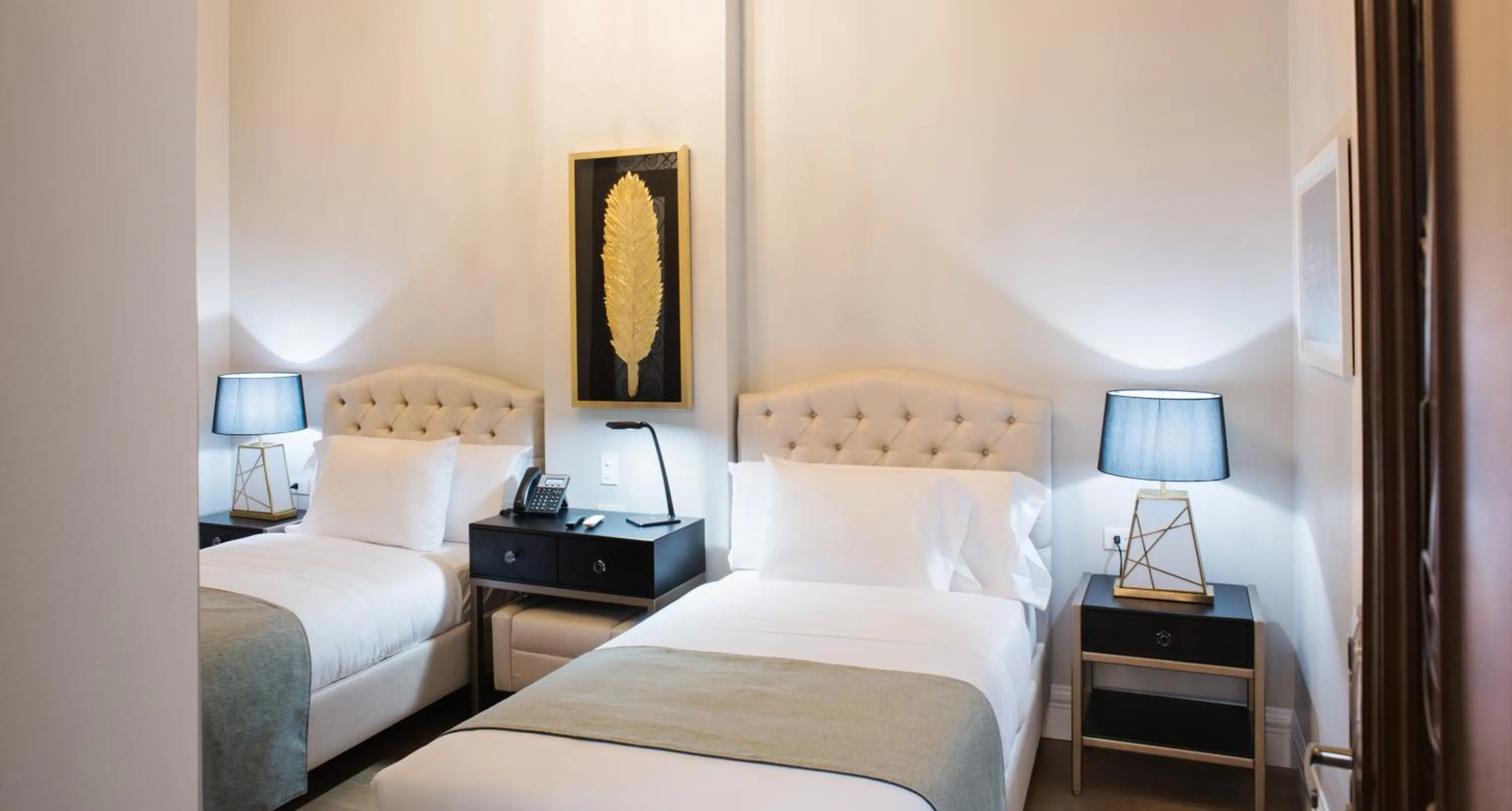Bed in Itza Hotel Boutique Internacional