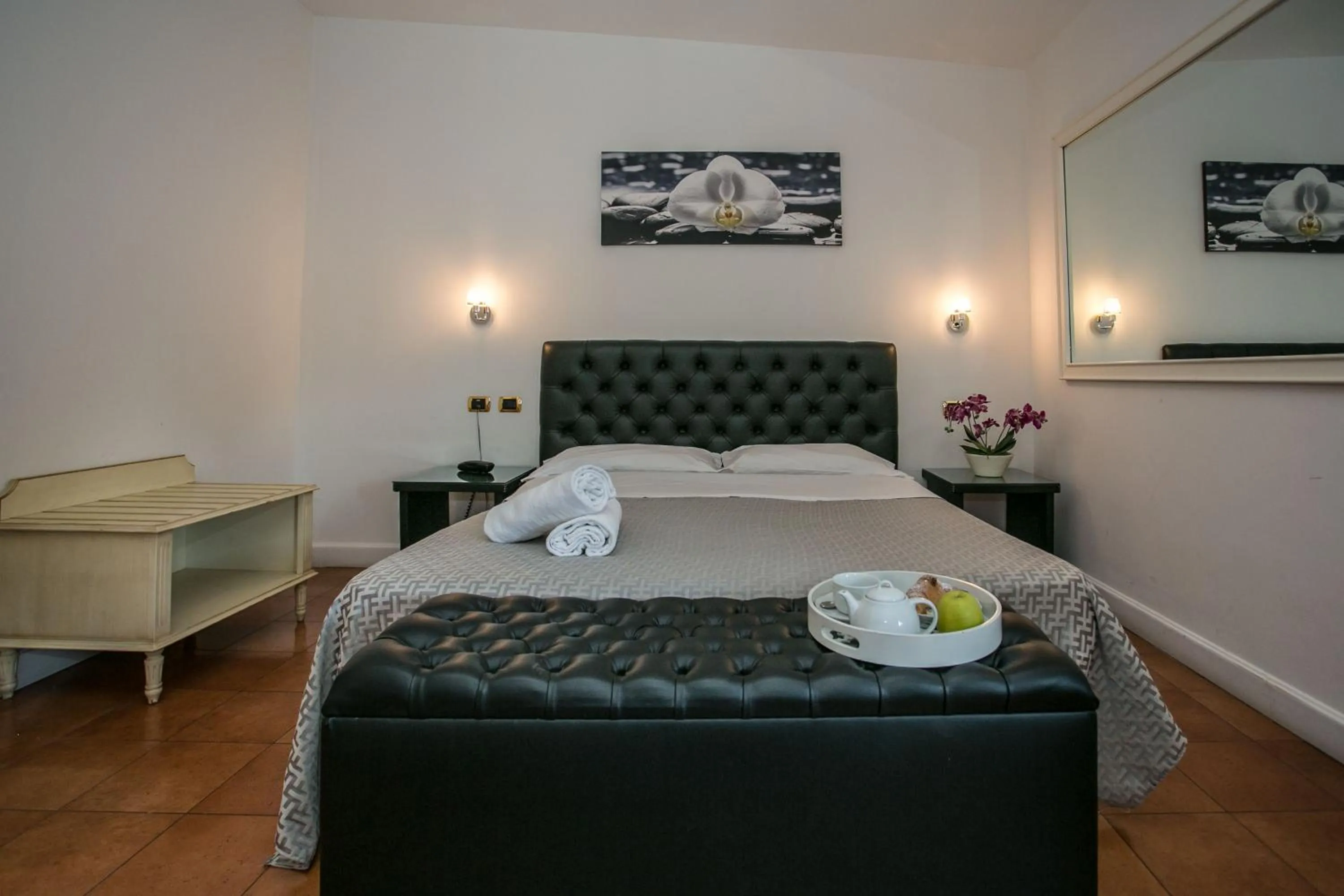 Bed in Hotel Quadrifoglio Roma Eur