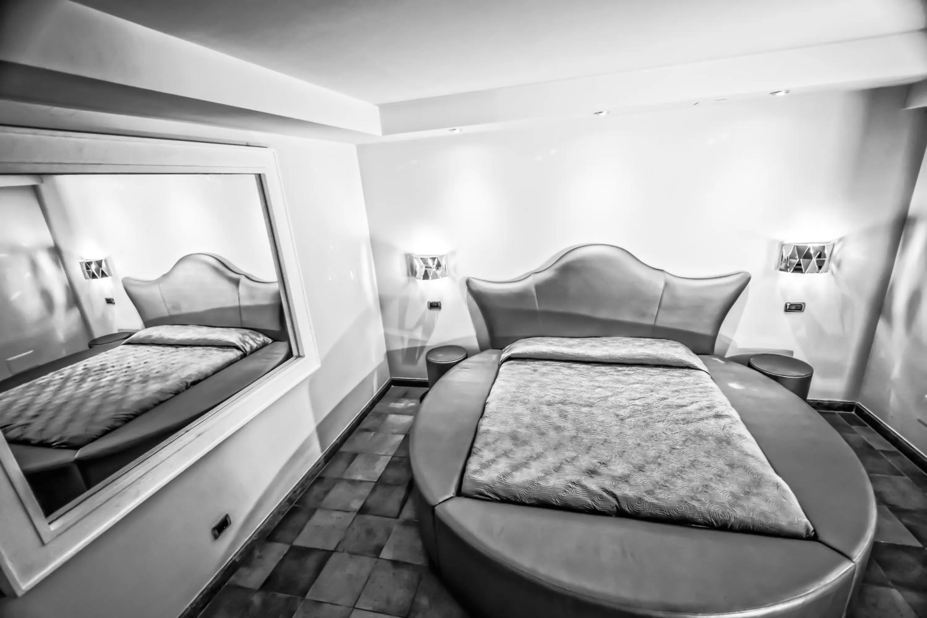 Decorative detail, Bed in Hotel Quadrifoglio Roma Eur