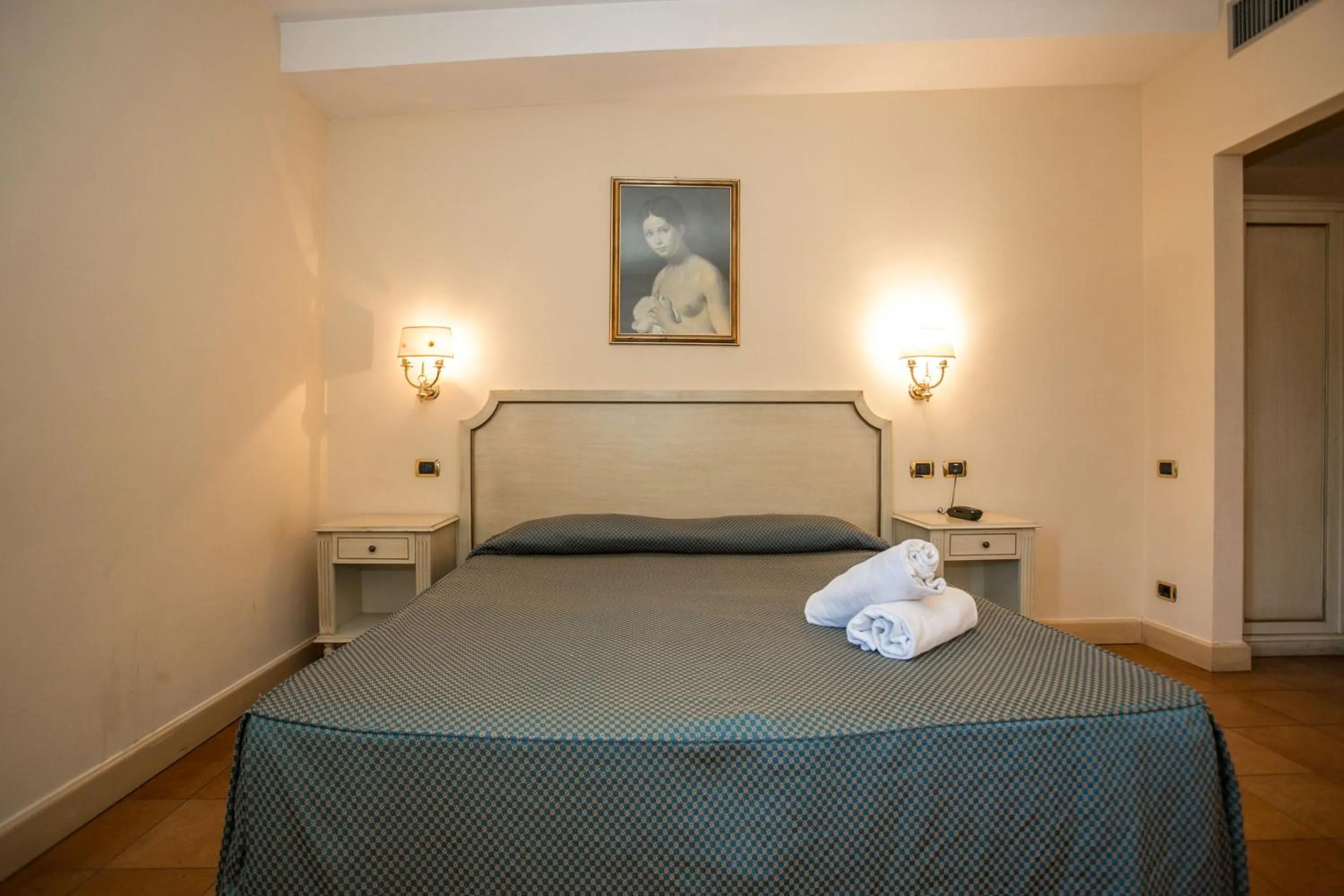 Bed in Hotel Quadrifoglio Roma Eur