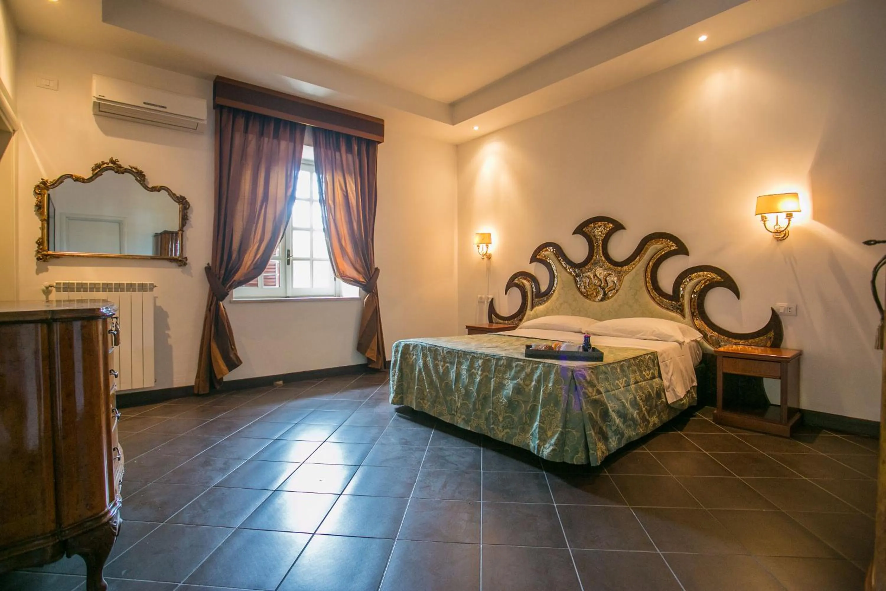 Bed in Hotel Quadrifoglio Roma Eur