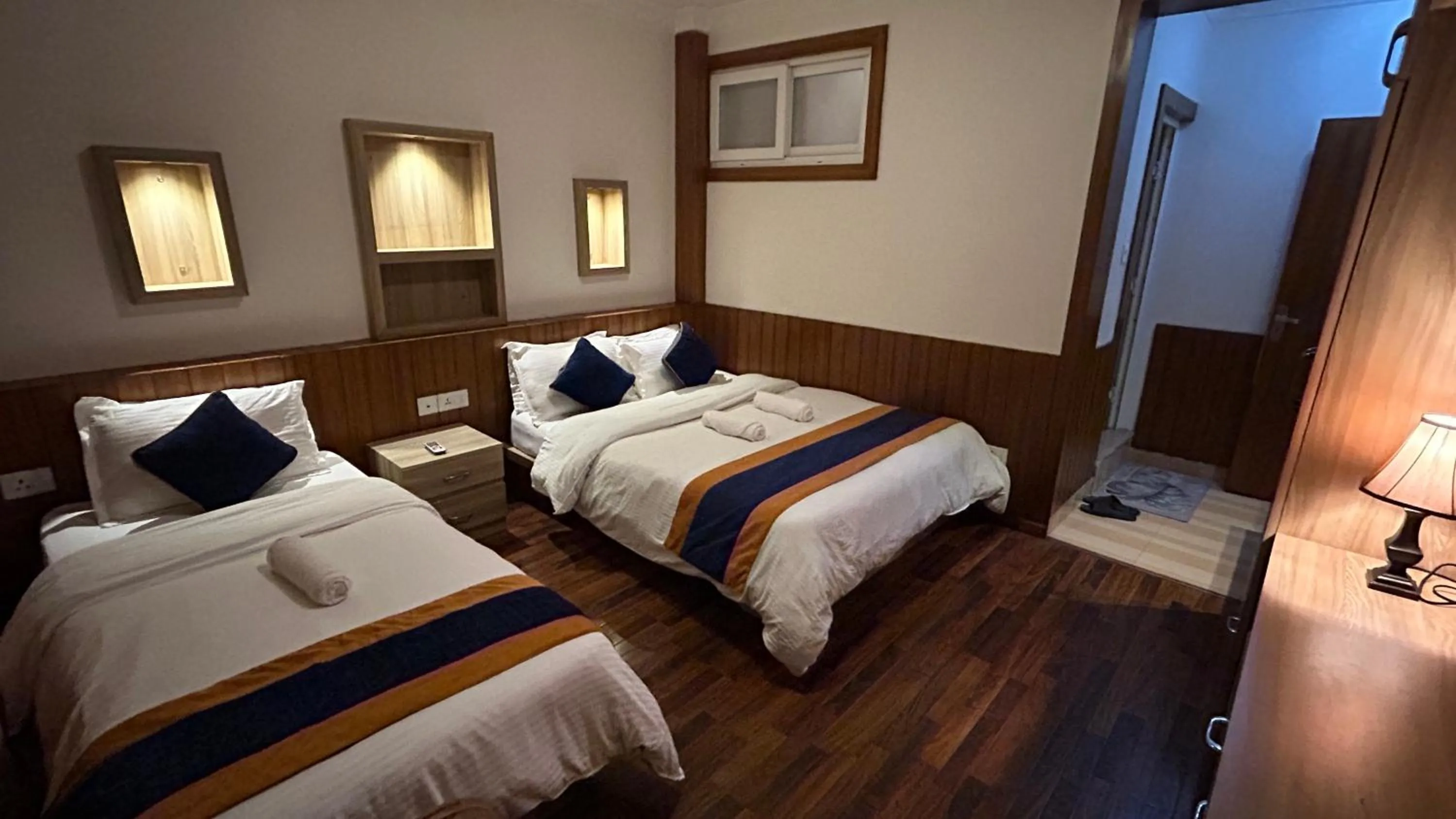 Bedroom, Bed in Raniban Suites - Apartment Home