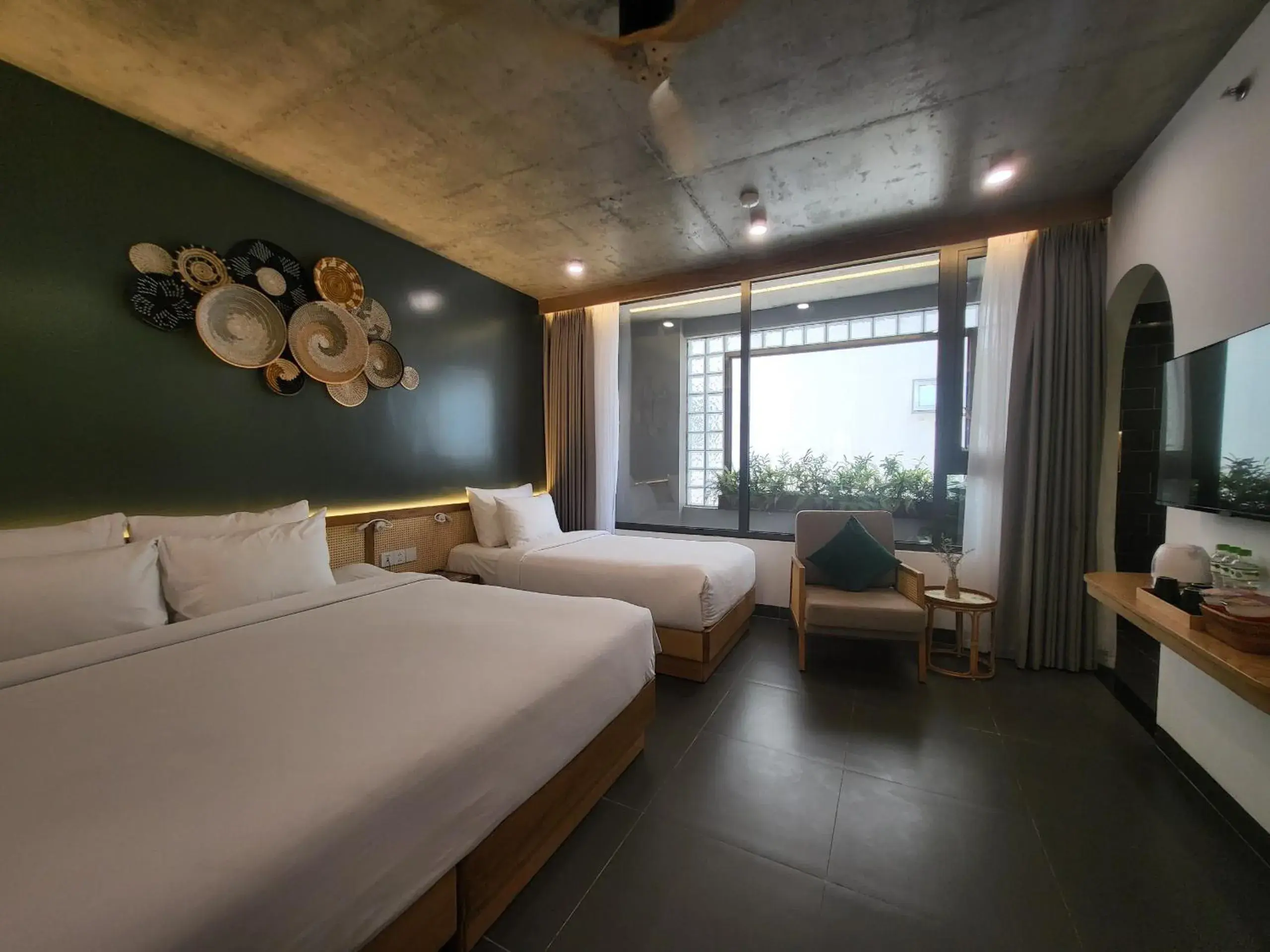 Deluxe Triple Room in Leaf Beachfront Hotel Da Nang Deluxe Triple Room in Leaf Beachfront Hotel Da Nang