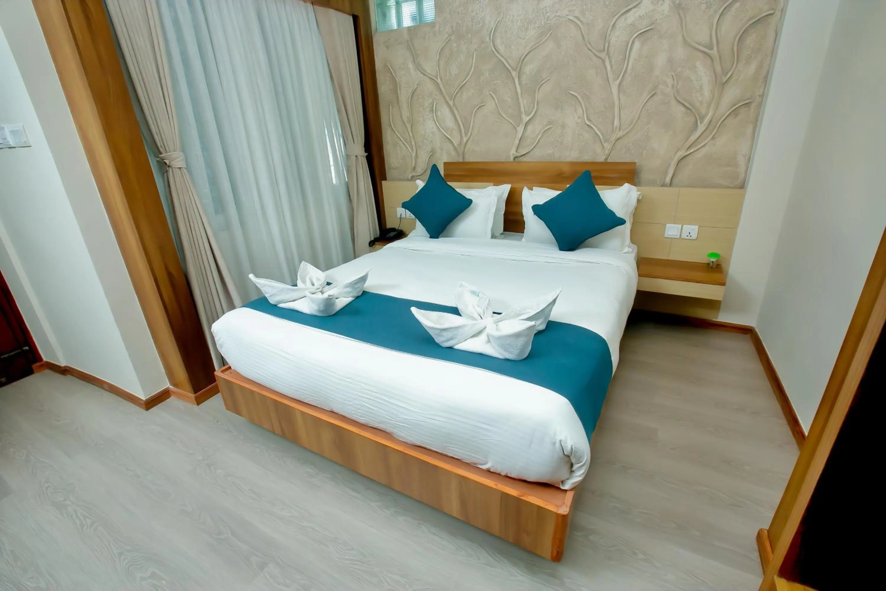 Bed in Maya Boutique Hotel