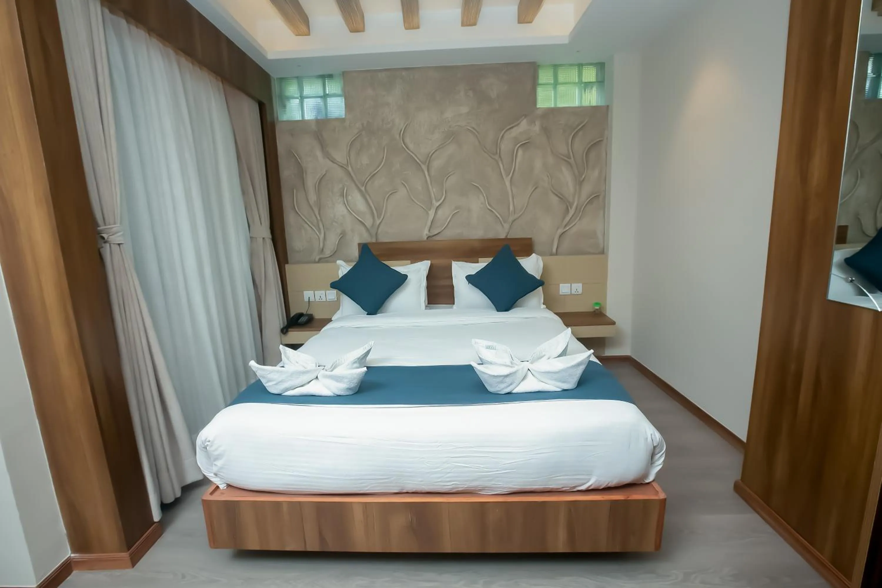 Bed in Maya Boutique Hotel
