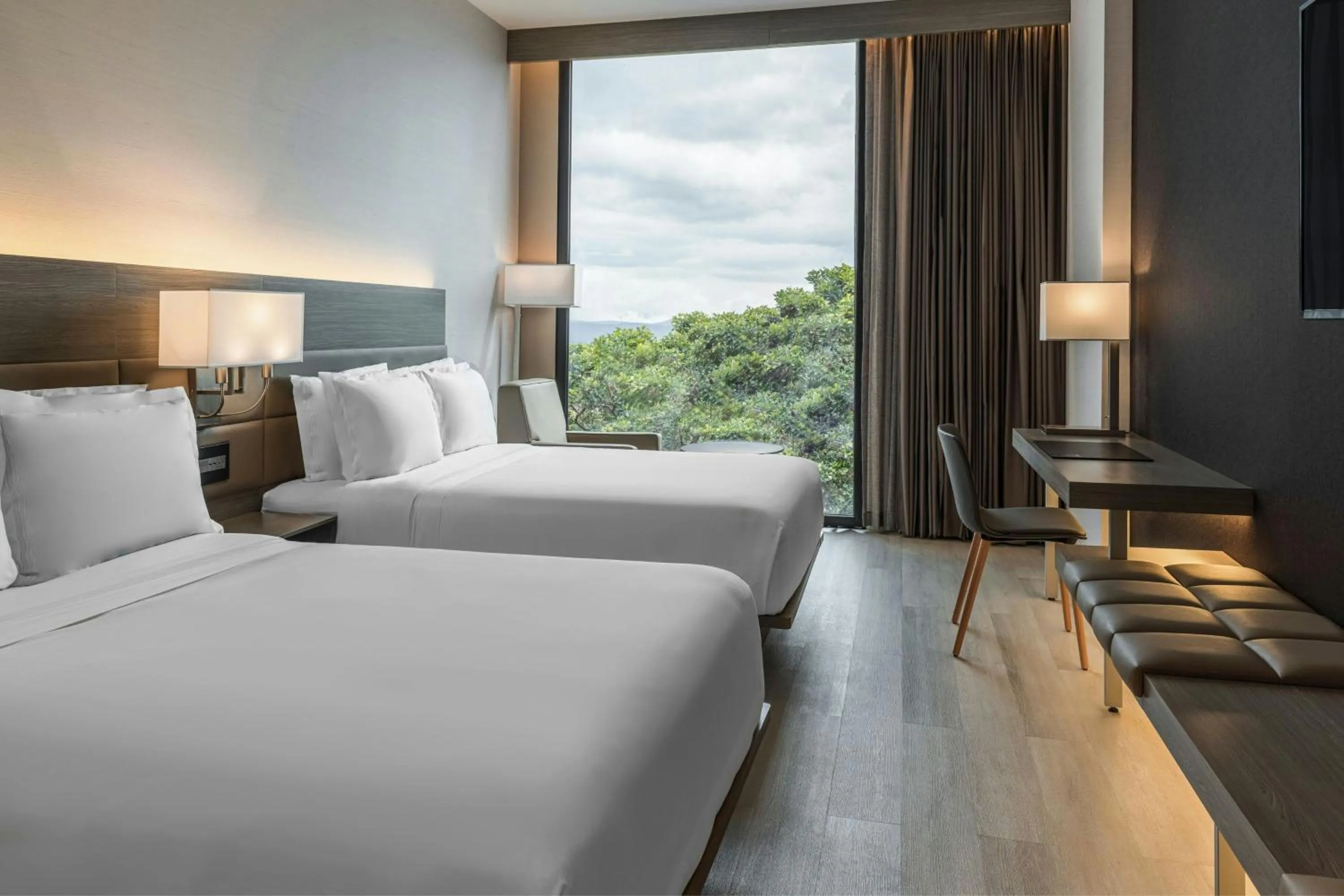 Photo of the whole room, Bed in AC Hotel San Jose Airport Belen