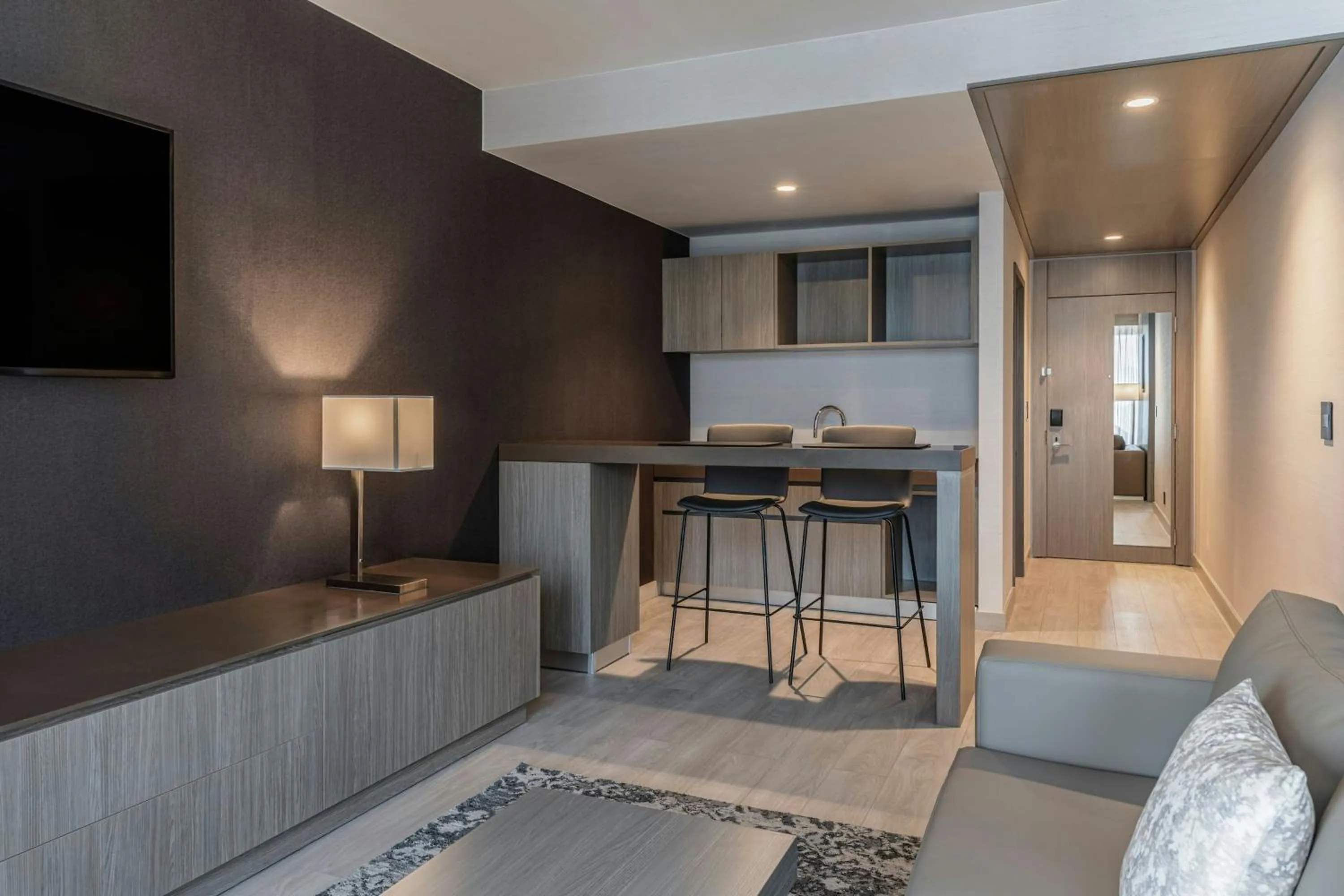 Living room in AC Hotel San Jose Airport Belen