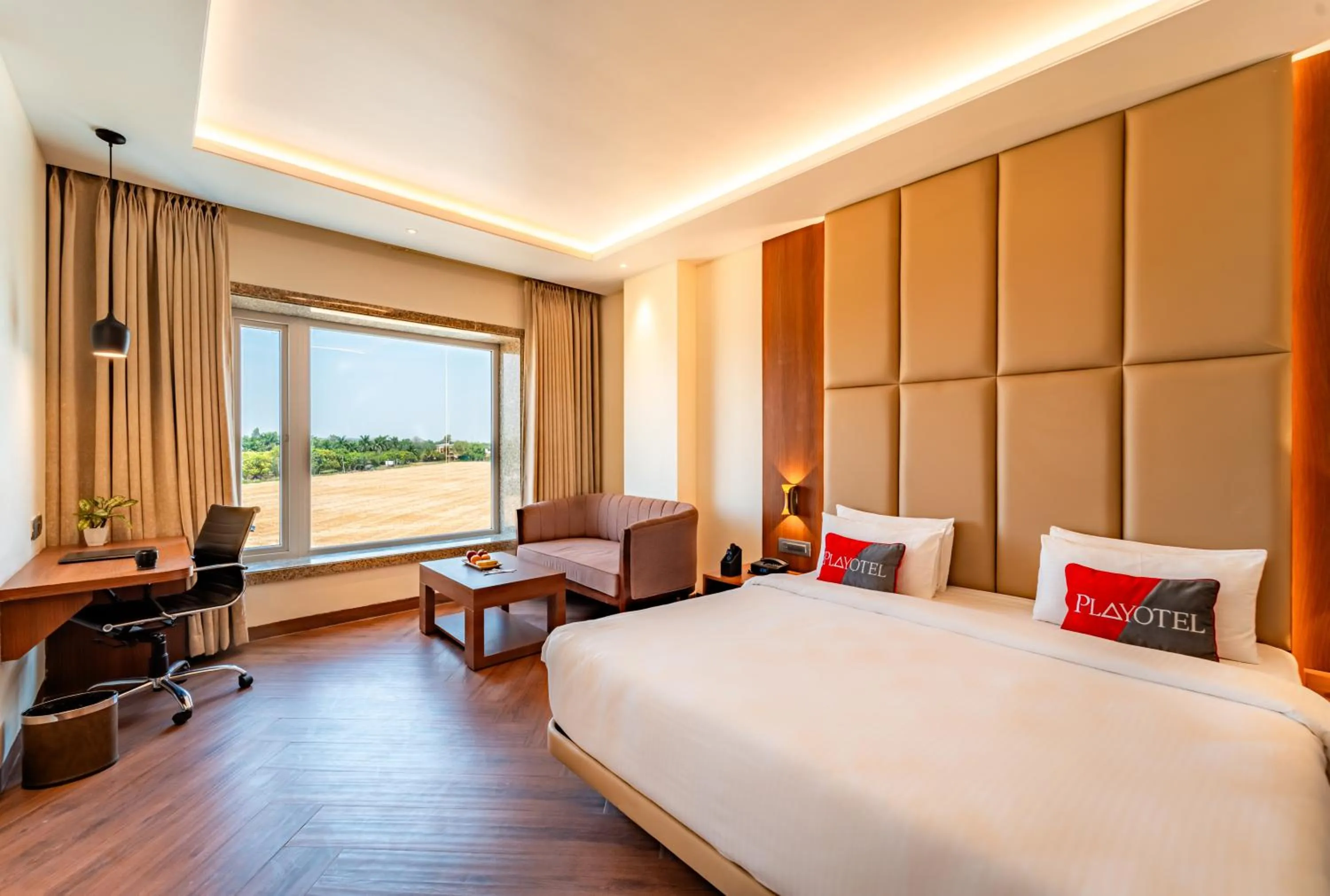 Bed in Playotel Resort Bhopal