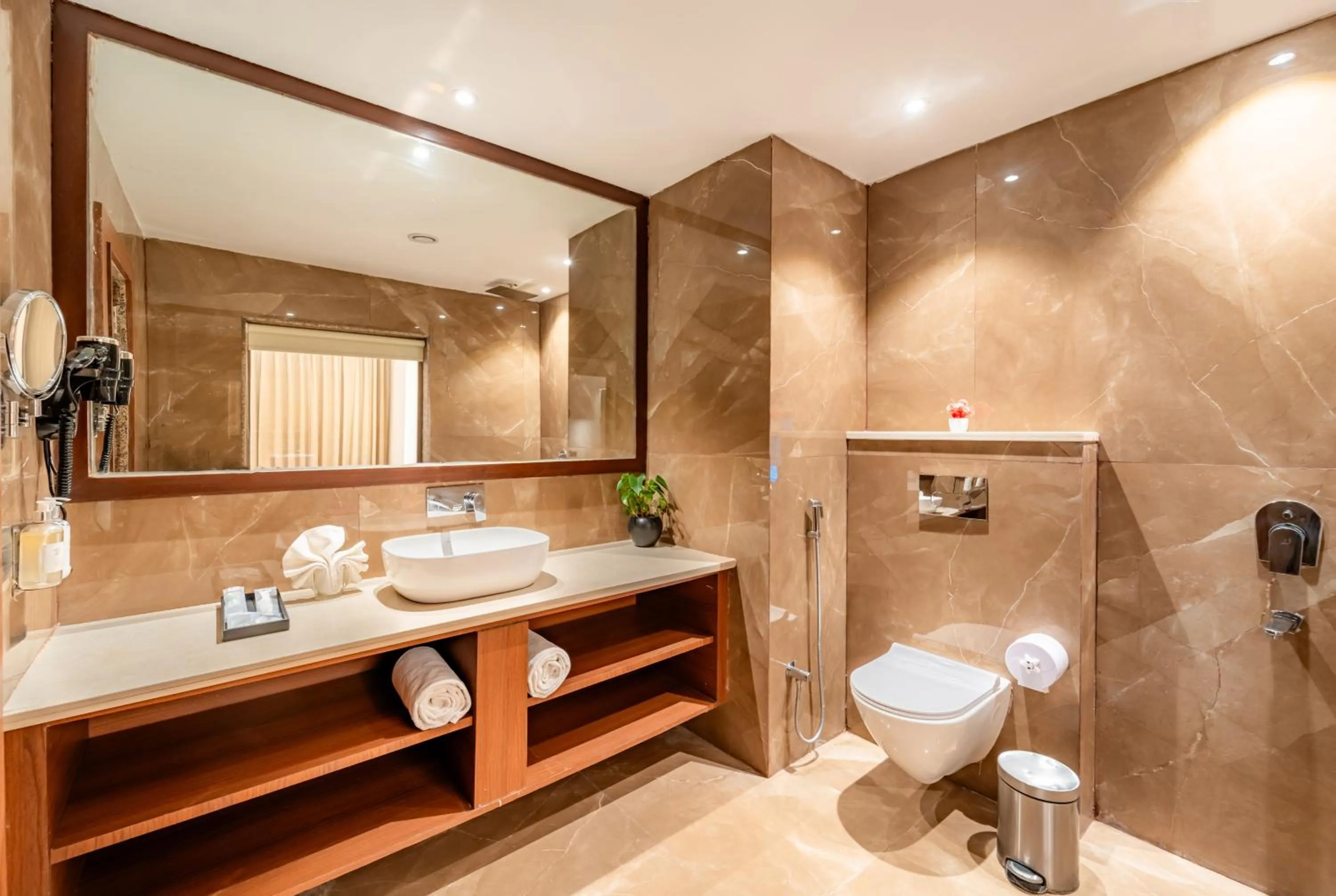 Toilet in Playotel Resort Bhopal