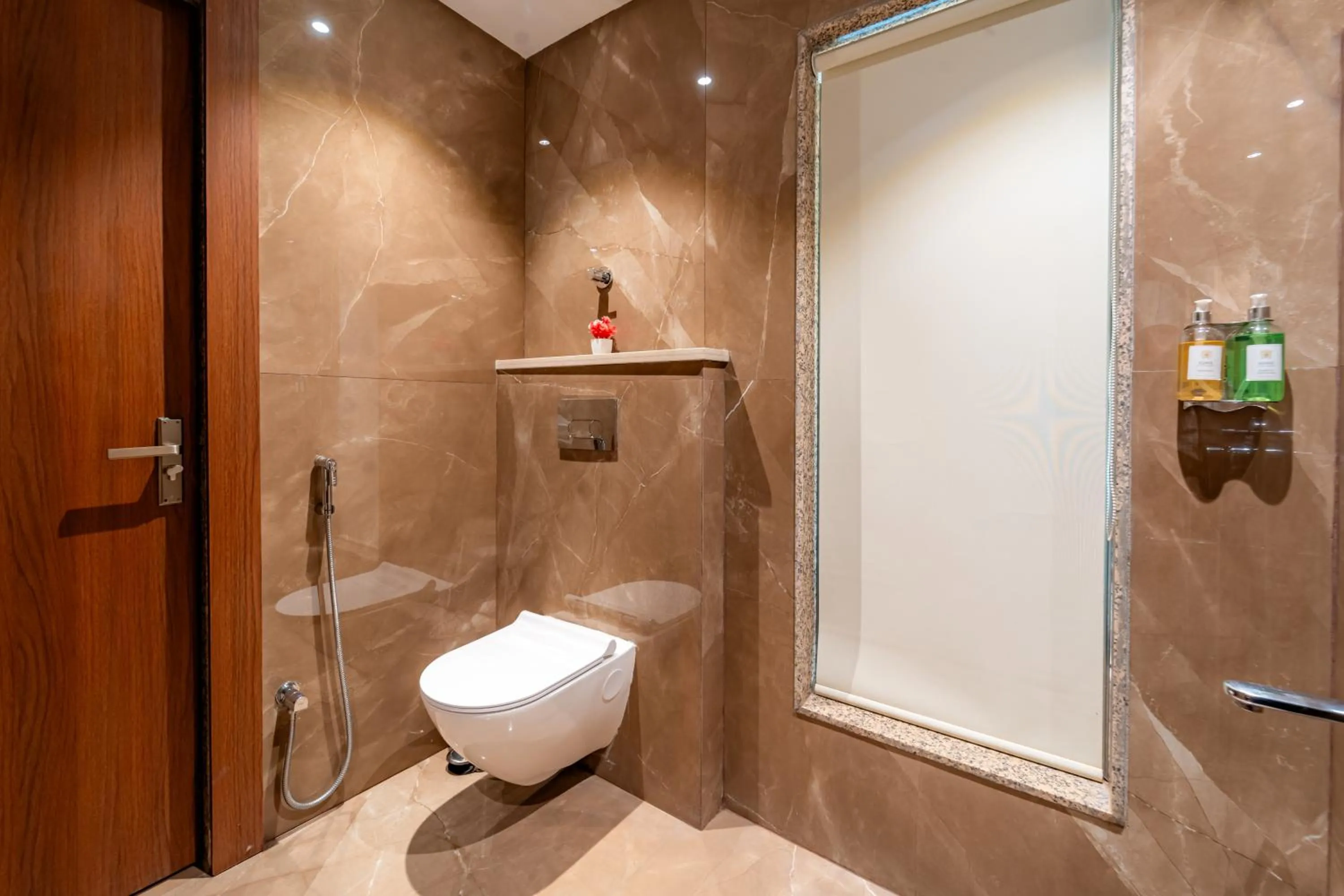 Toilet in Playotel Resort Bhopal