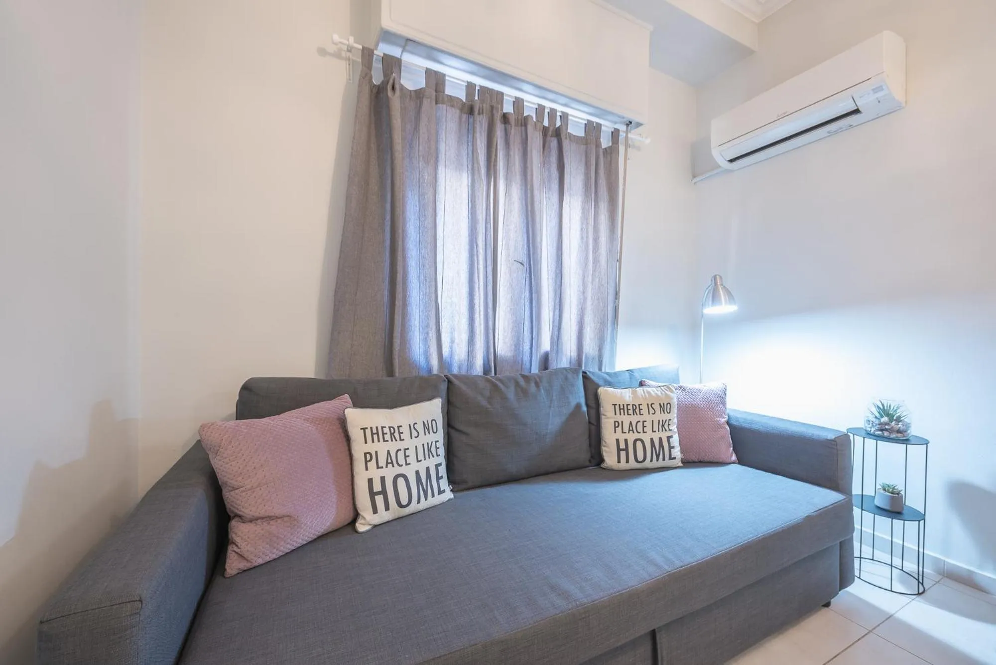 Living room, Bed in Erythros Boutique Suite By Cloudkeys