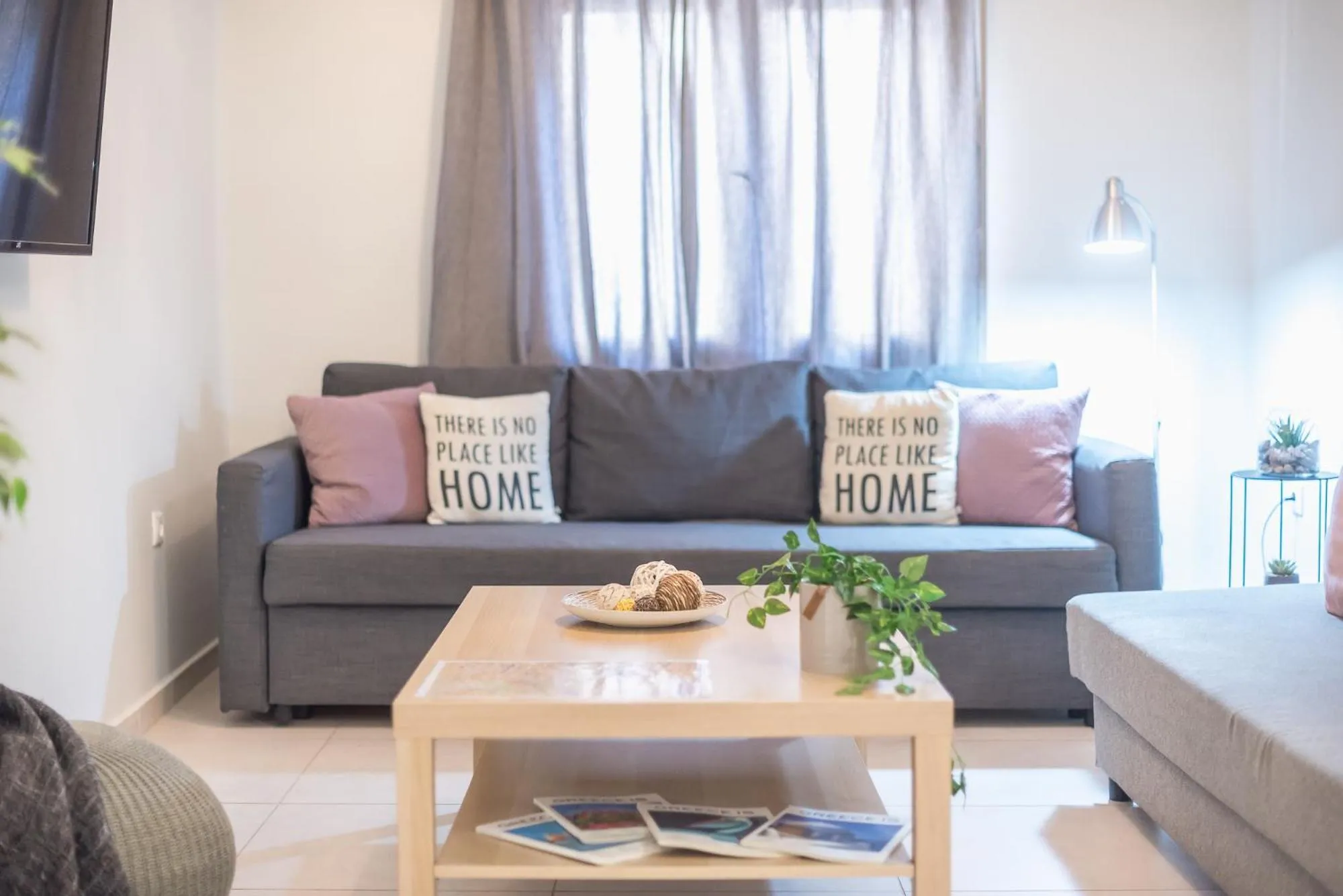 Living room in Erythros Boutique Suite By Cloudkeys