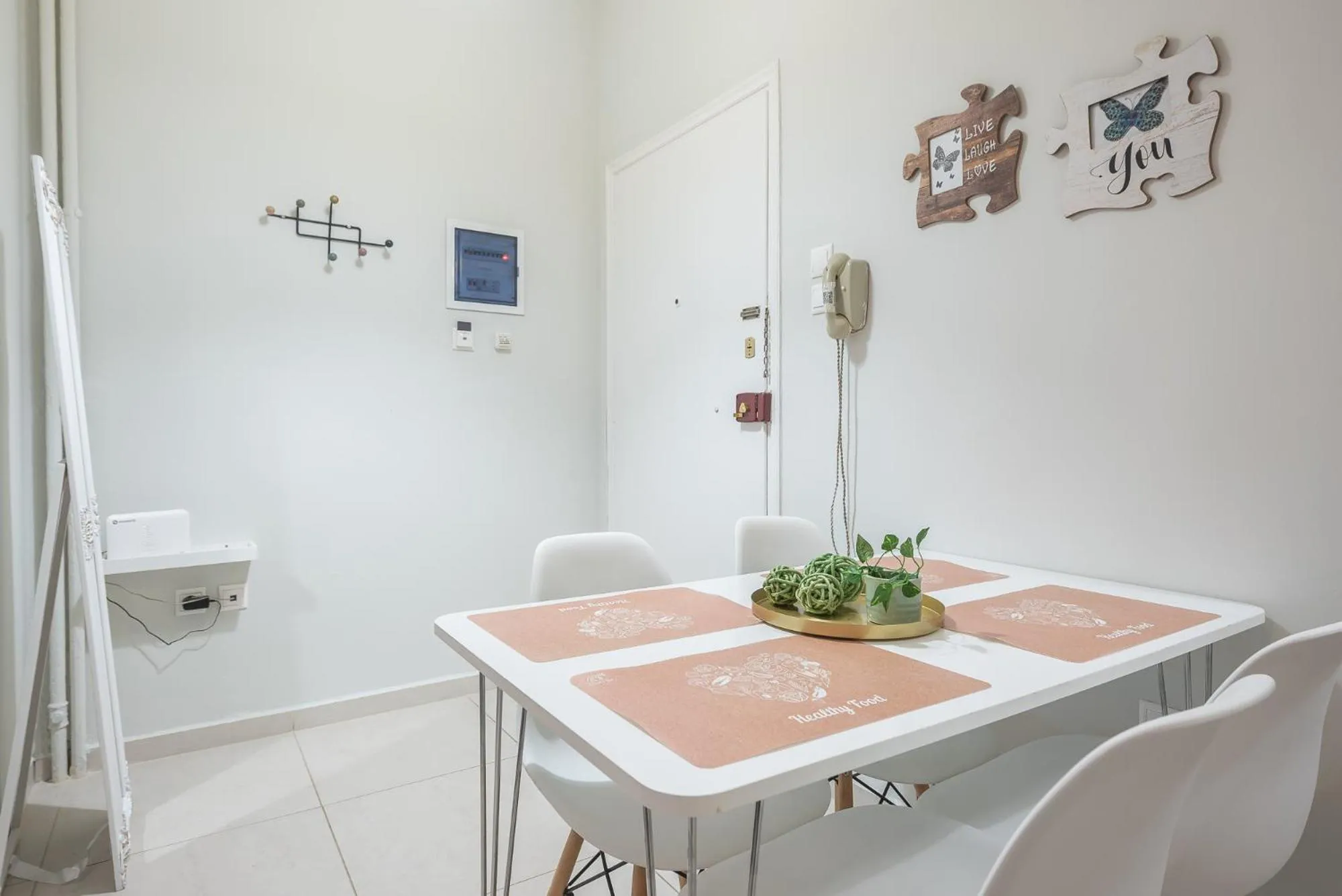 Dining area in Erythros Boutique Suite By Cloudkeys