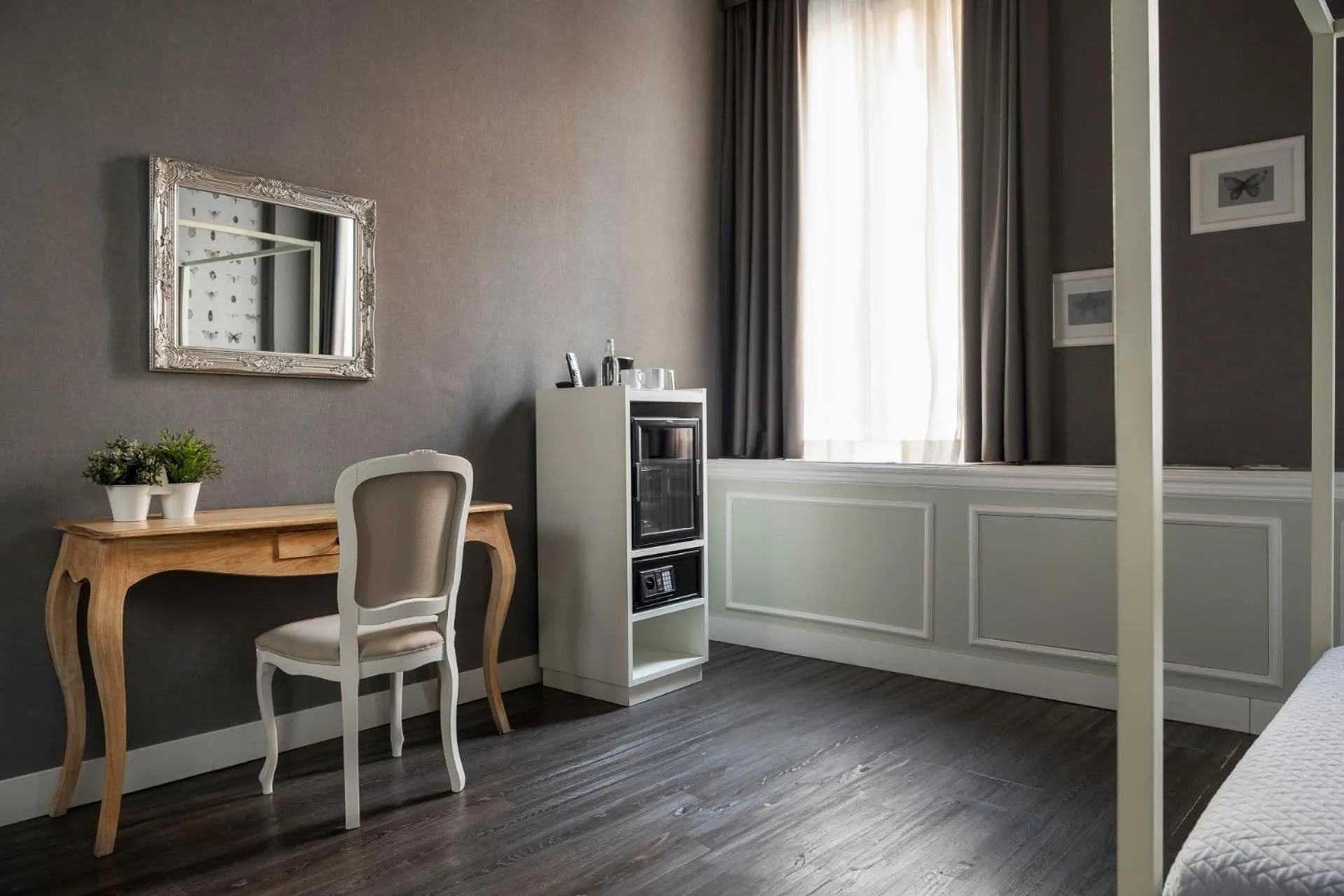 Bed in Maxxim Hotel & Loft