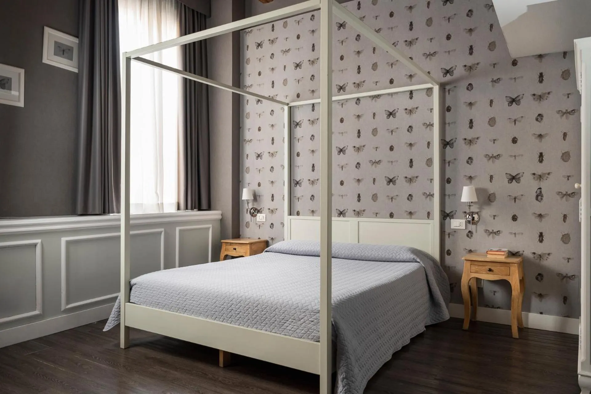 Bed in Maxxim Hotel & Loft