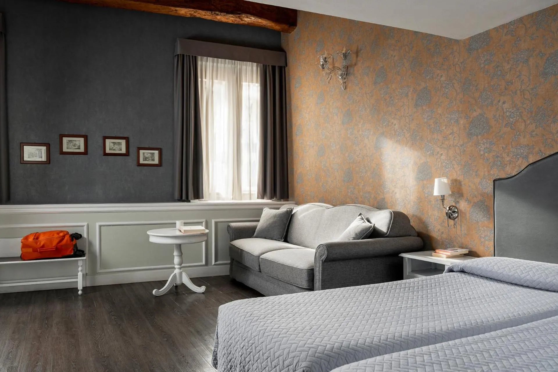 Bed in Maxxim Hotel & Loft