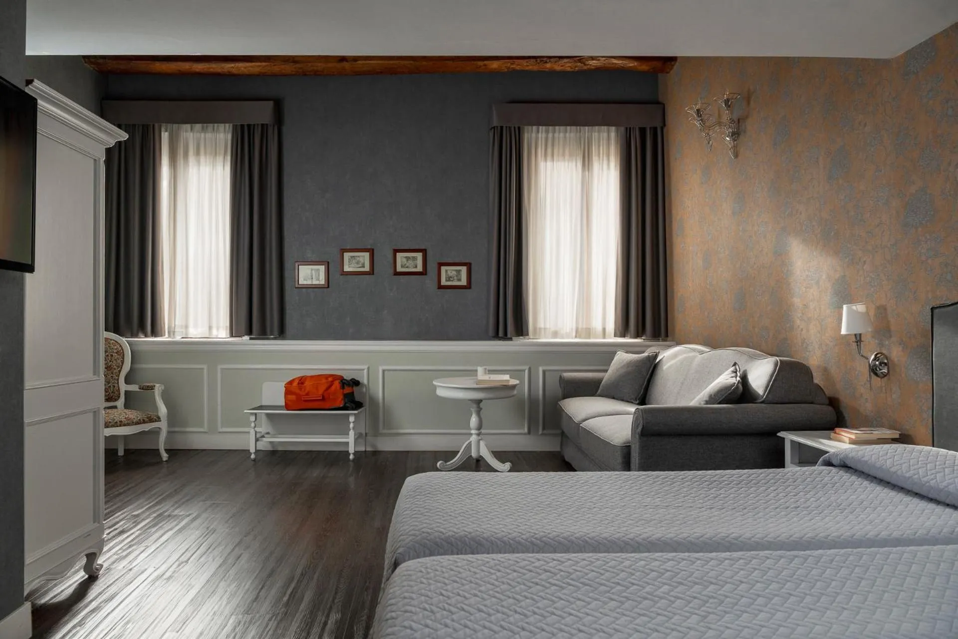 Bed in Maxxim Hotel & Loft