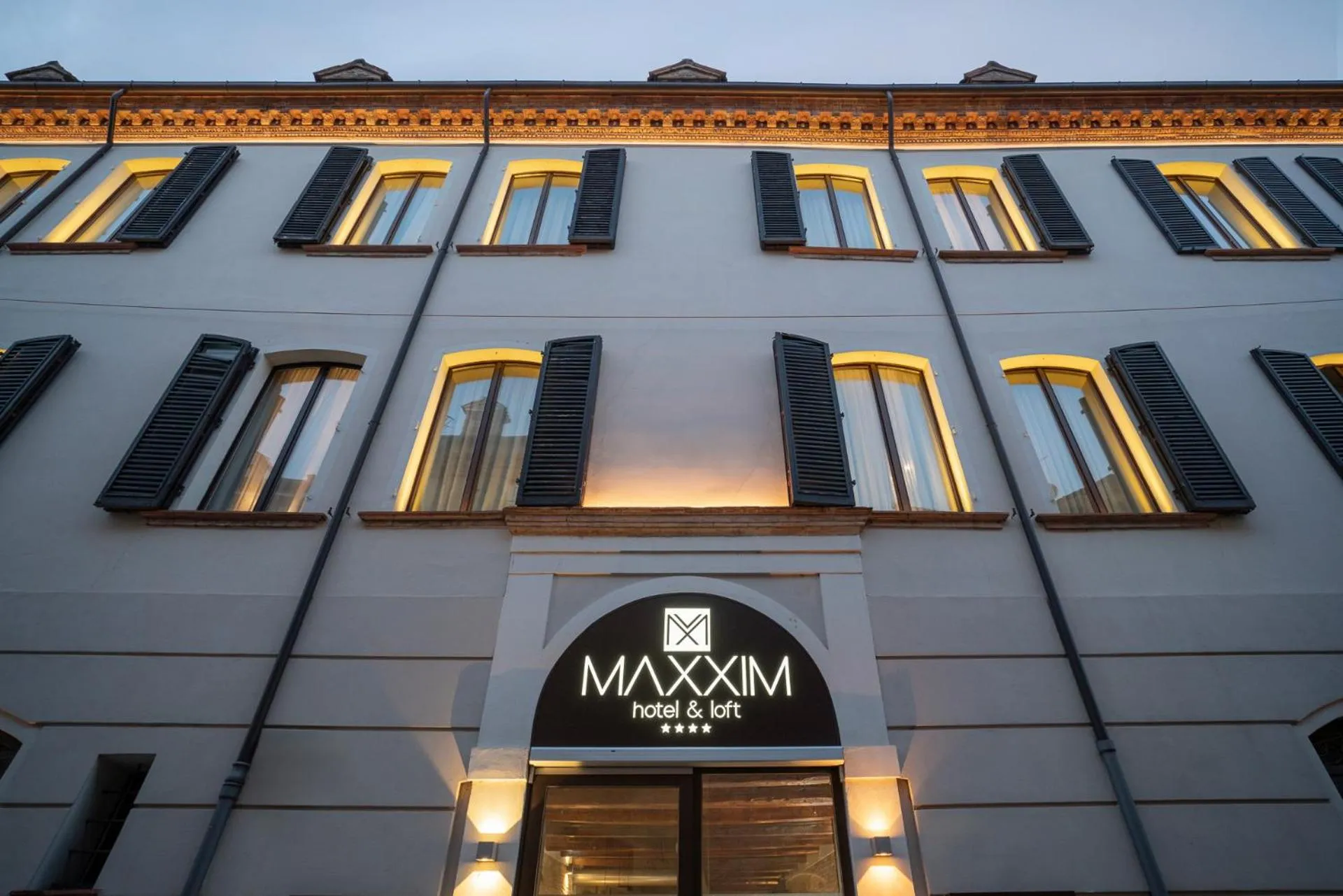 Property building in Maxxim Hotel & Loft