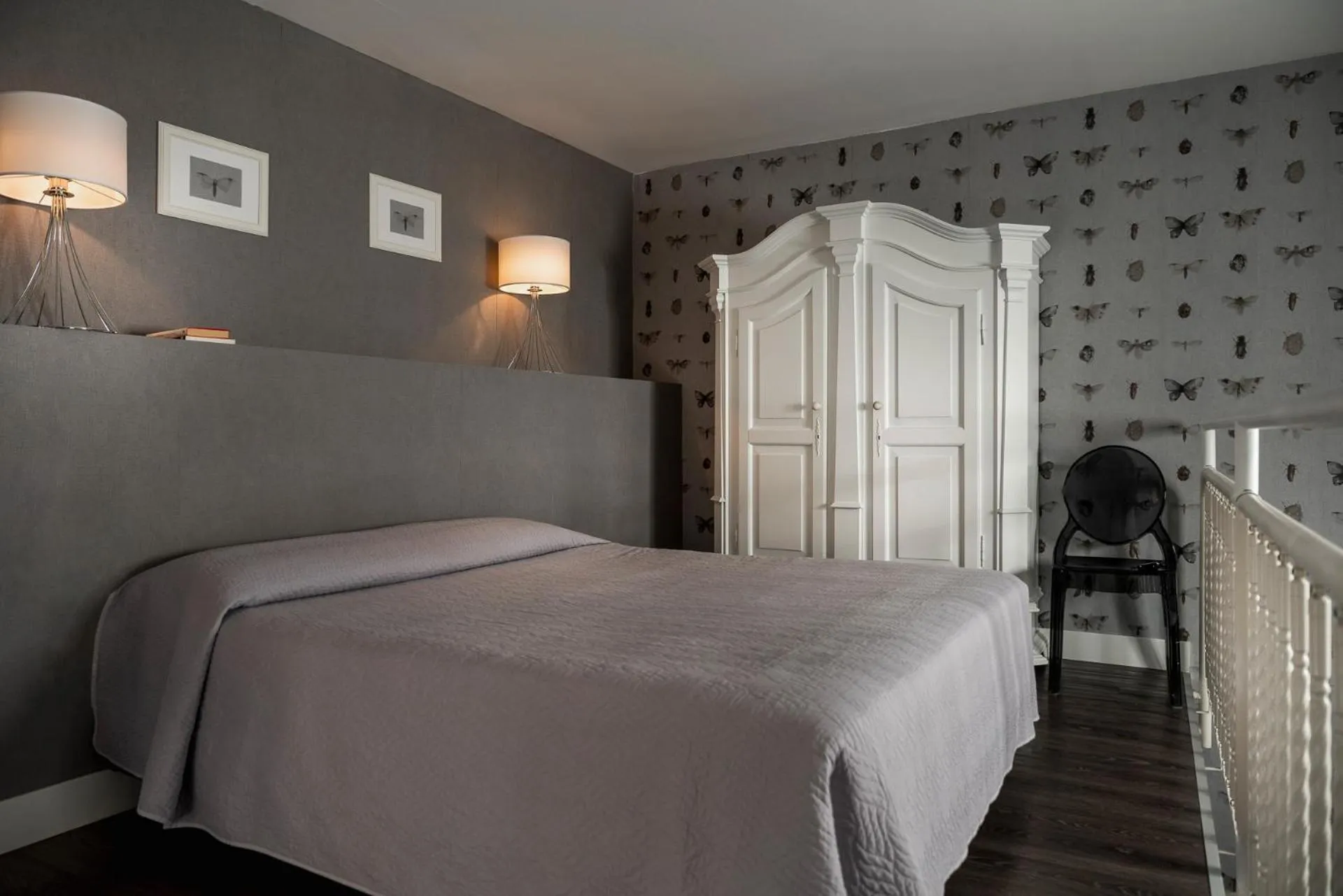 Bed in Maxxim Hotel & Loft