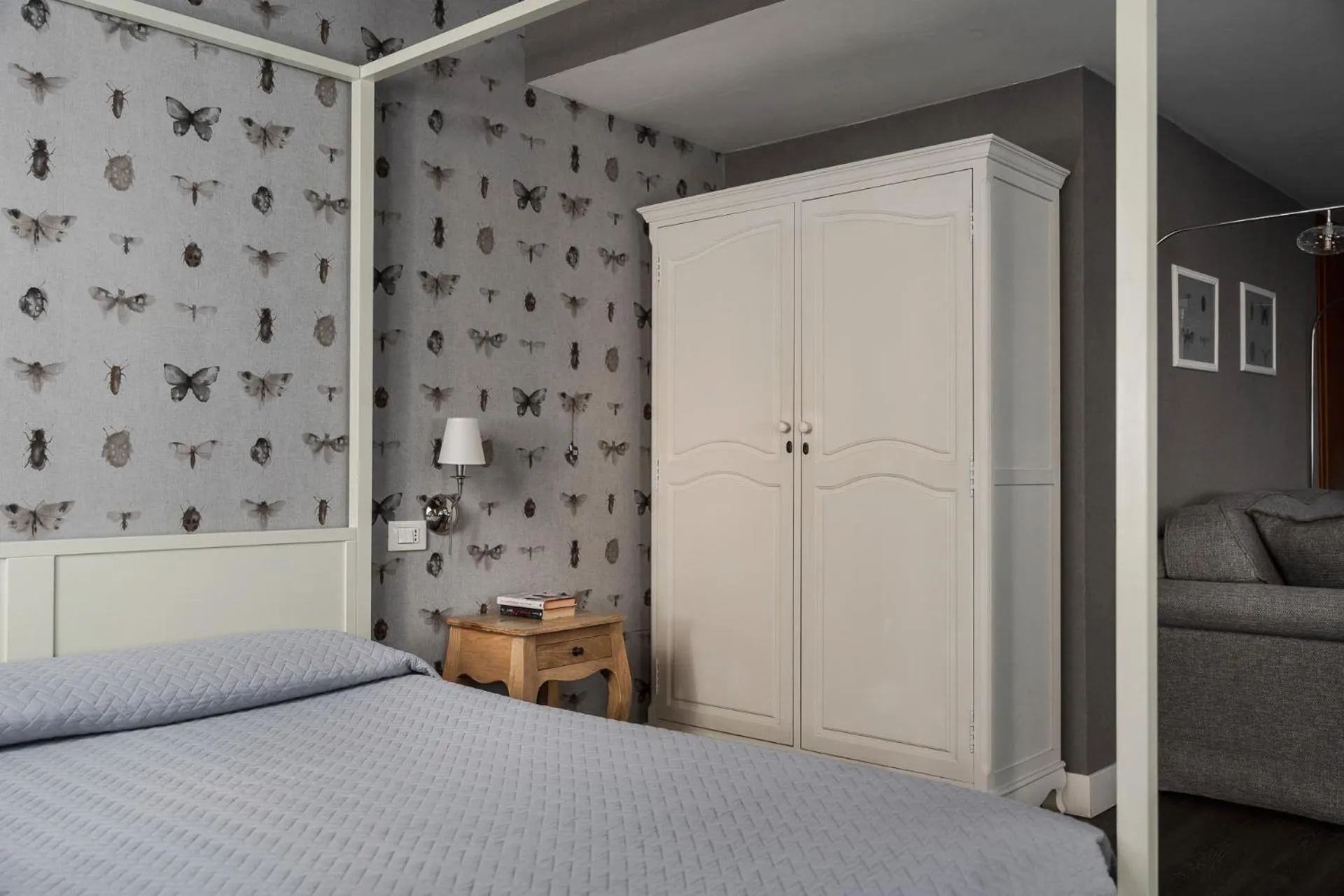 Bed in Maxxim Hotel & Loft