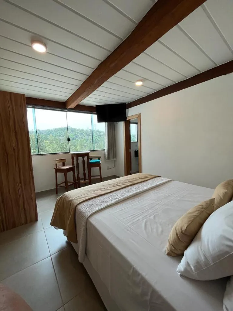 Bed in Pousada Mar Mineiro Macacos