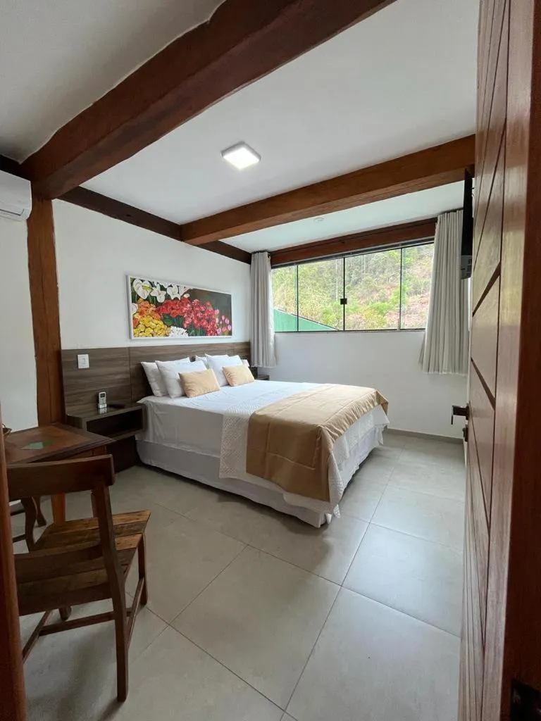 Bed in Pousada Mar Mineiro Macacos