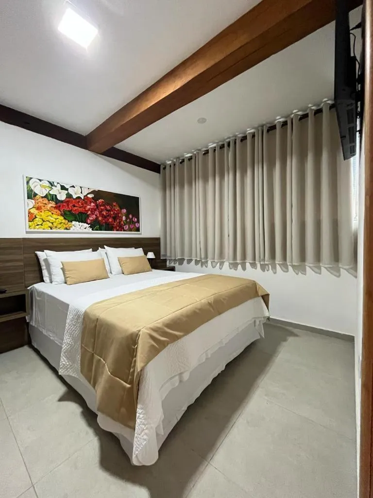 Bed in Pousada Mar Mineiro Macacos