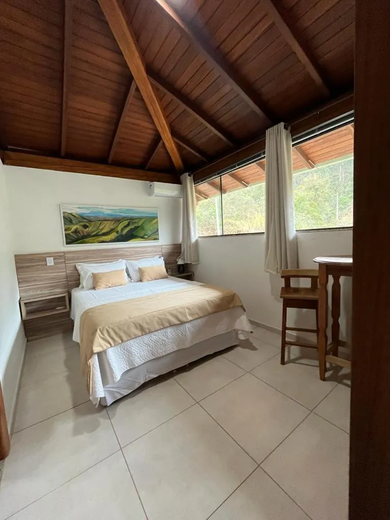 Bed in Pousada Mar Mineiro Macacos