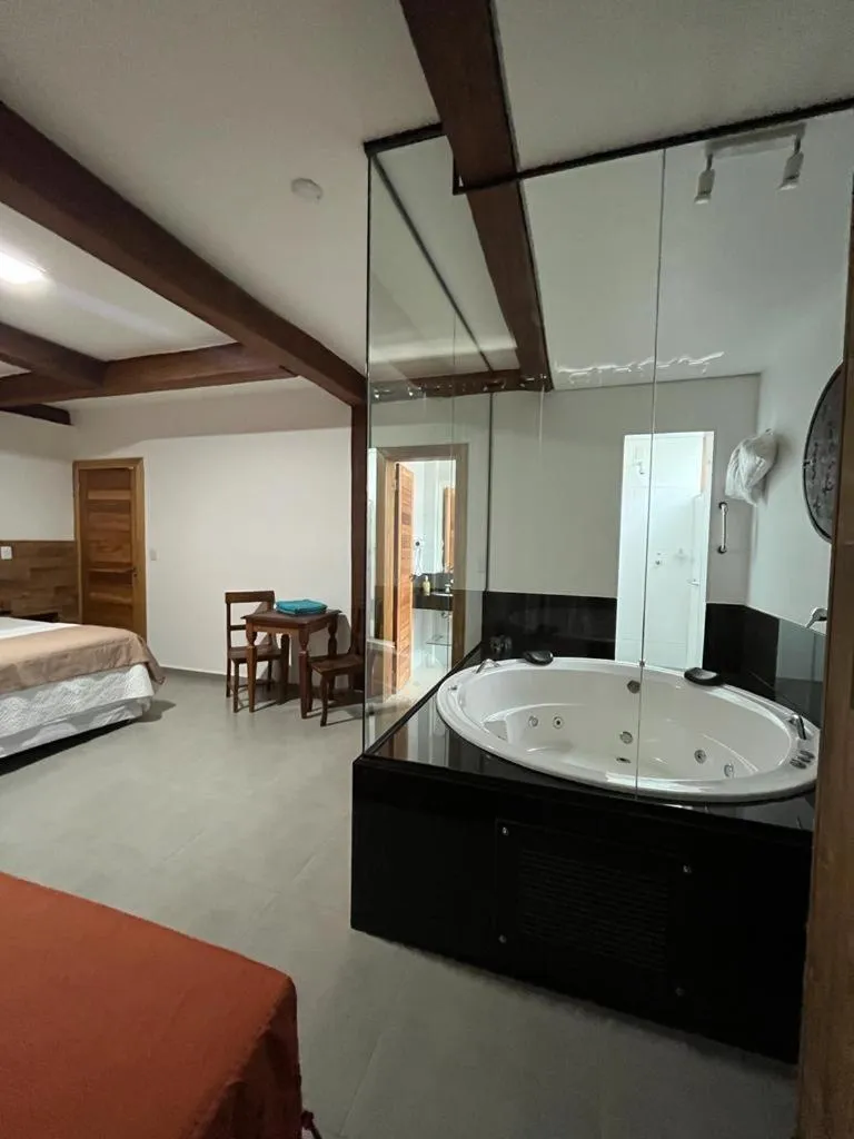 Bed in Pousada Mar Mineiro Macacos