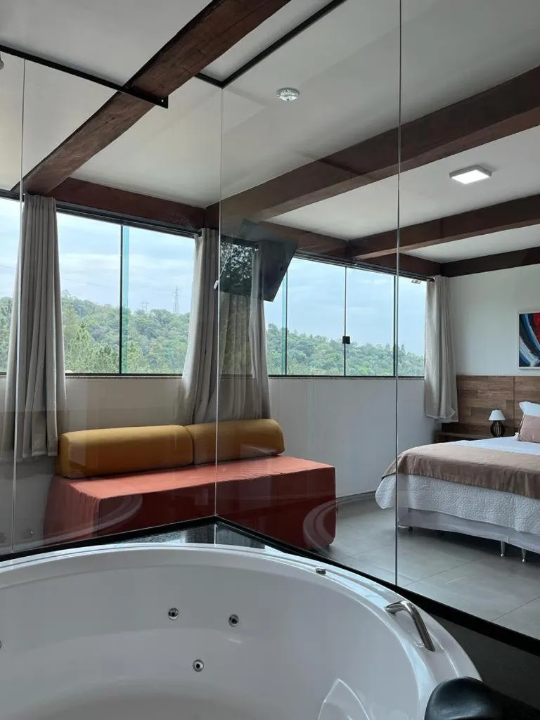 Bed in Pousada Mar Mineiro Macacos