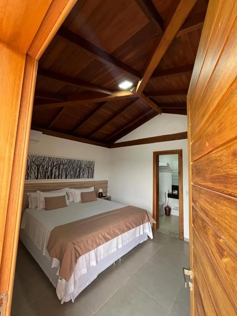 Bed in Pousada Mar Mineiro Macacos