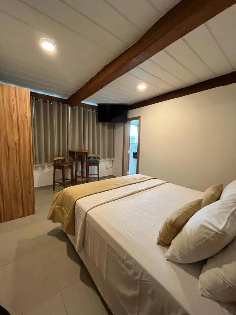 Bed in Pousada Mar Mineiro Macacos